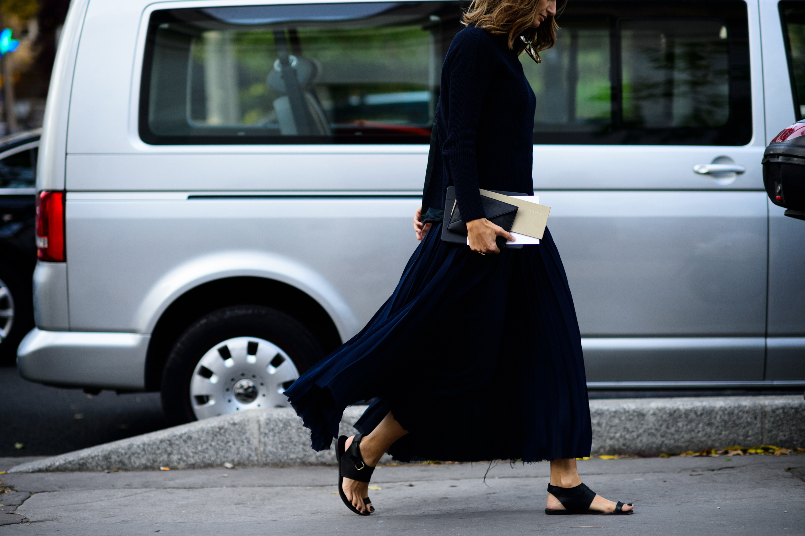 Stylist and editor wearing black sandals