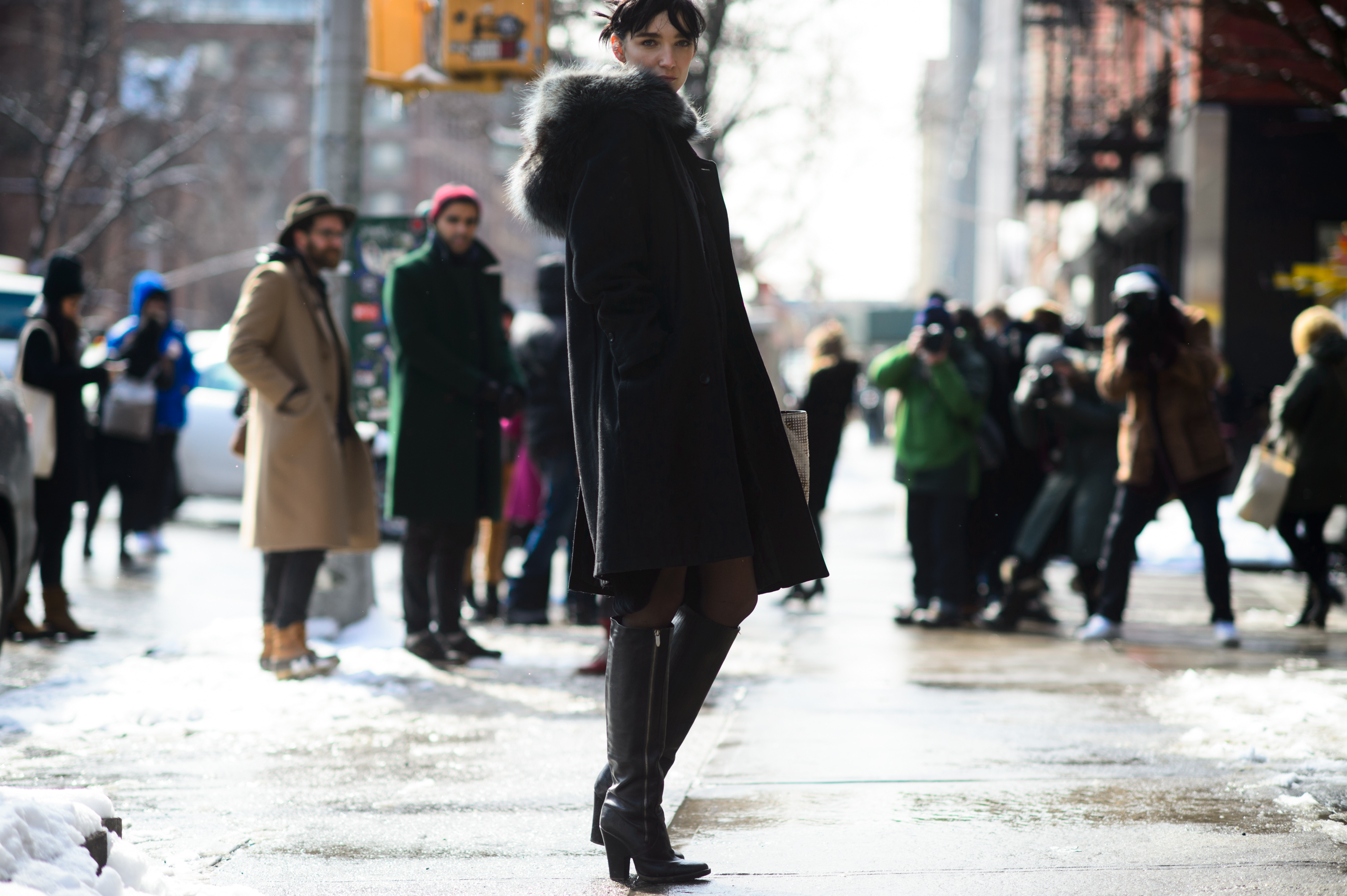 Woman wearing black coat