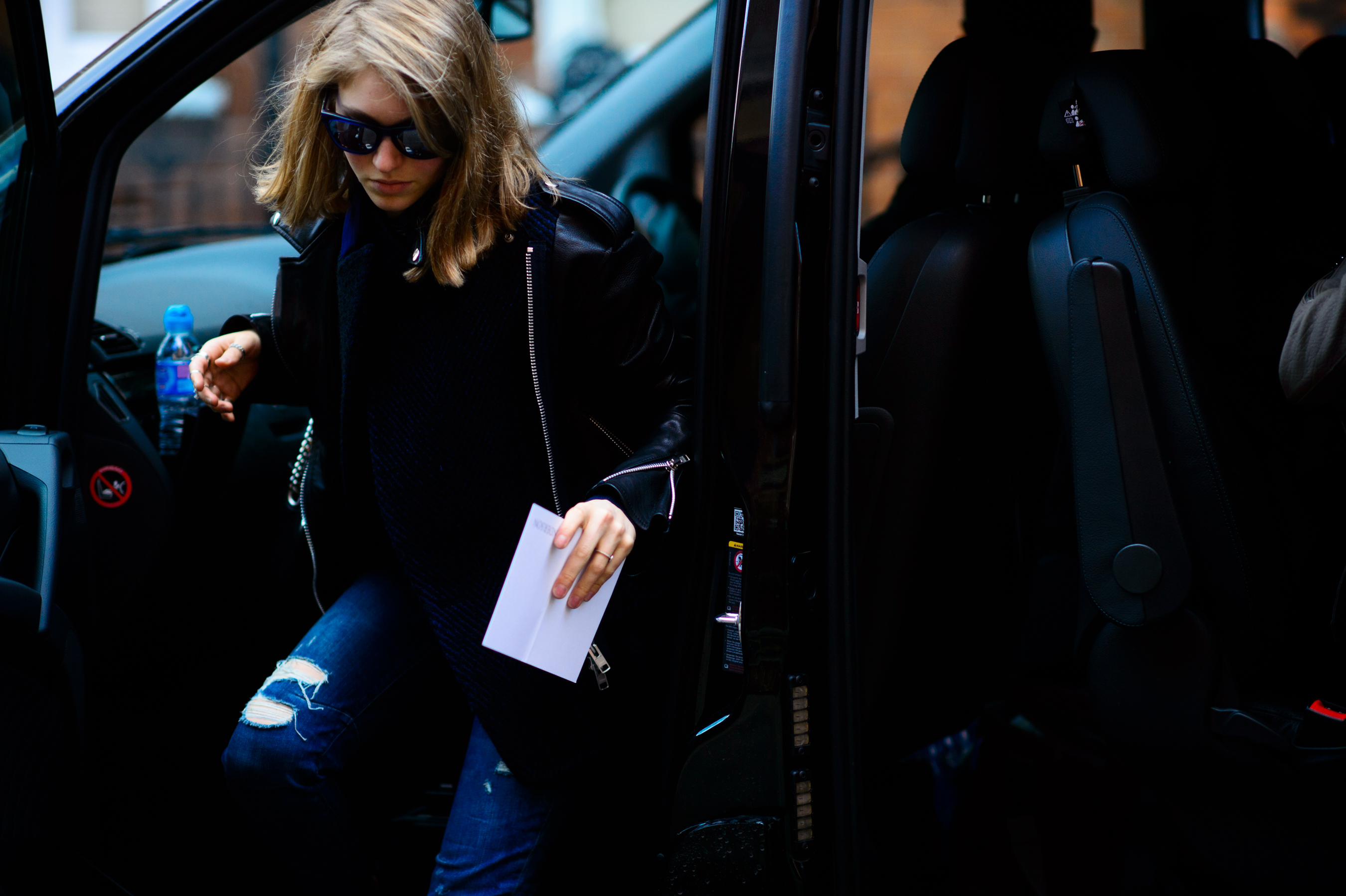 Woman getting out of the car