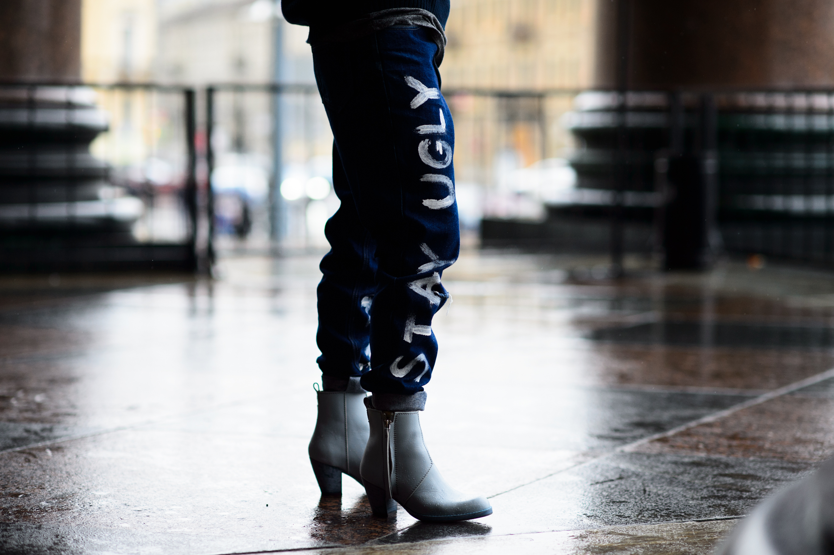 Jeans with words written on them