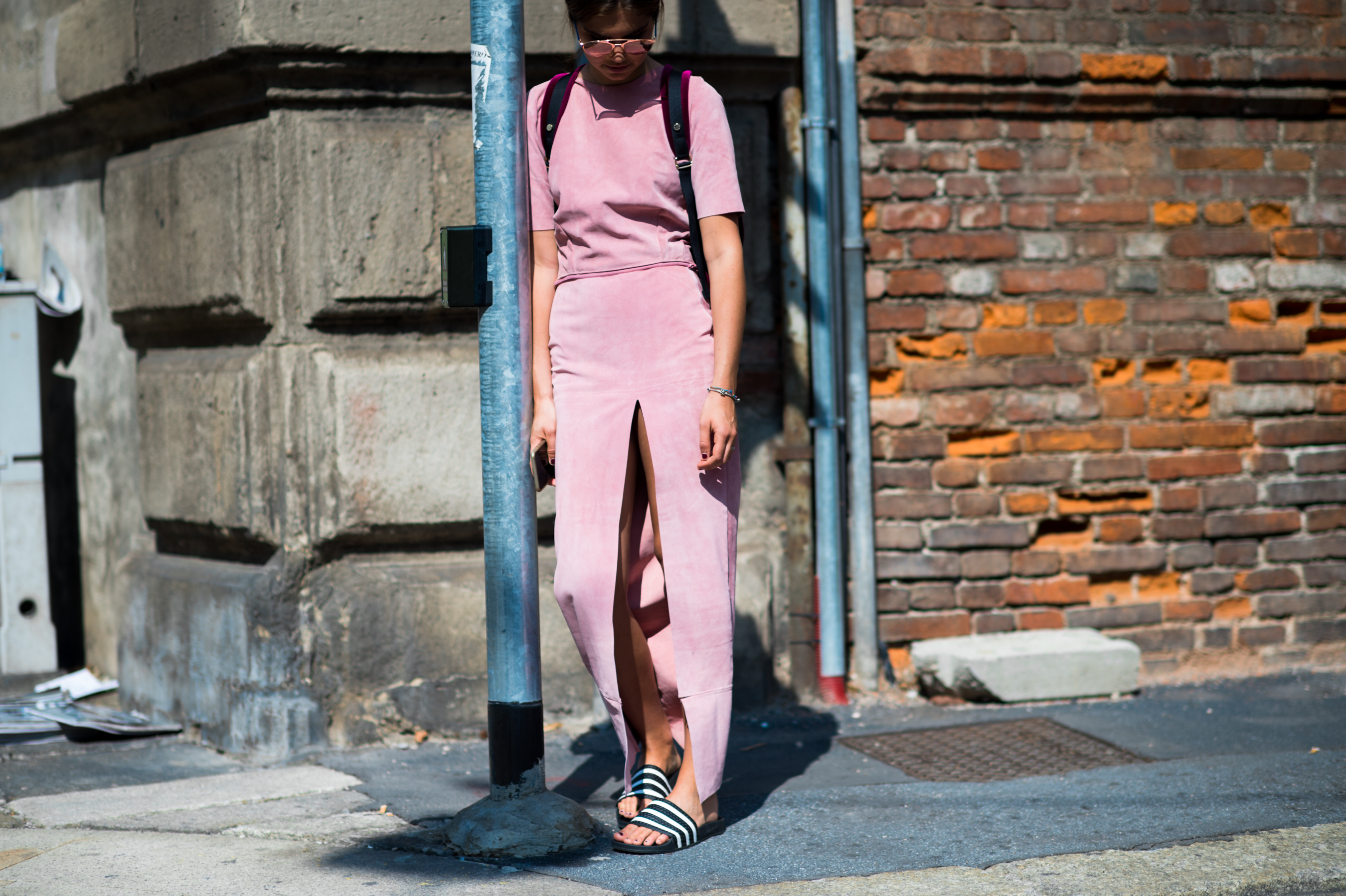 Young designer wearing pink outfit