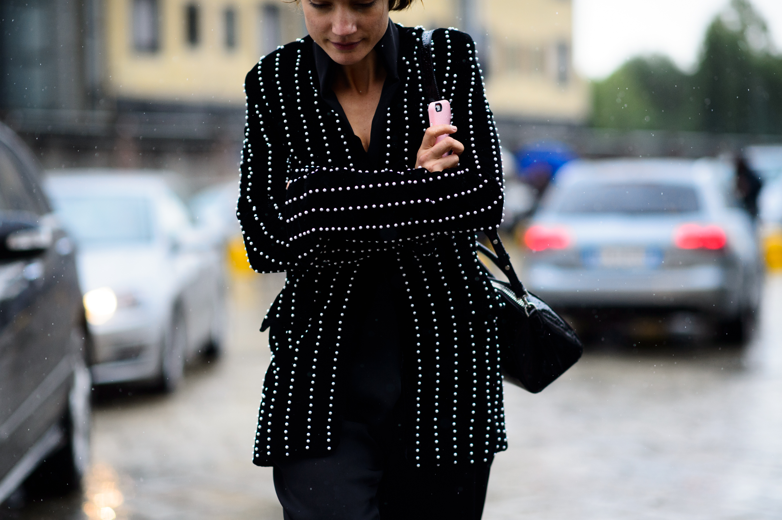 Woman wearing black jacket before the show