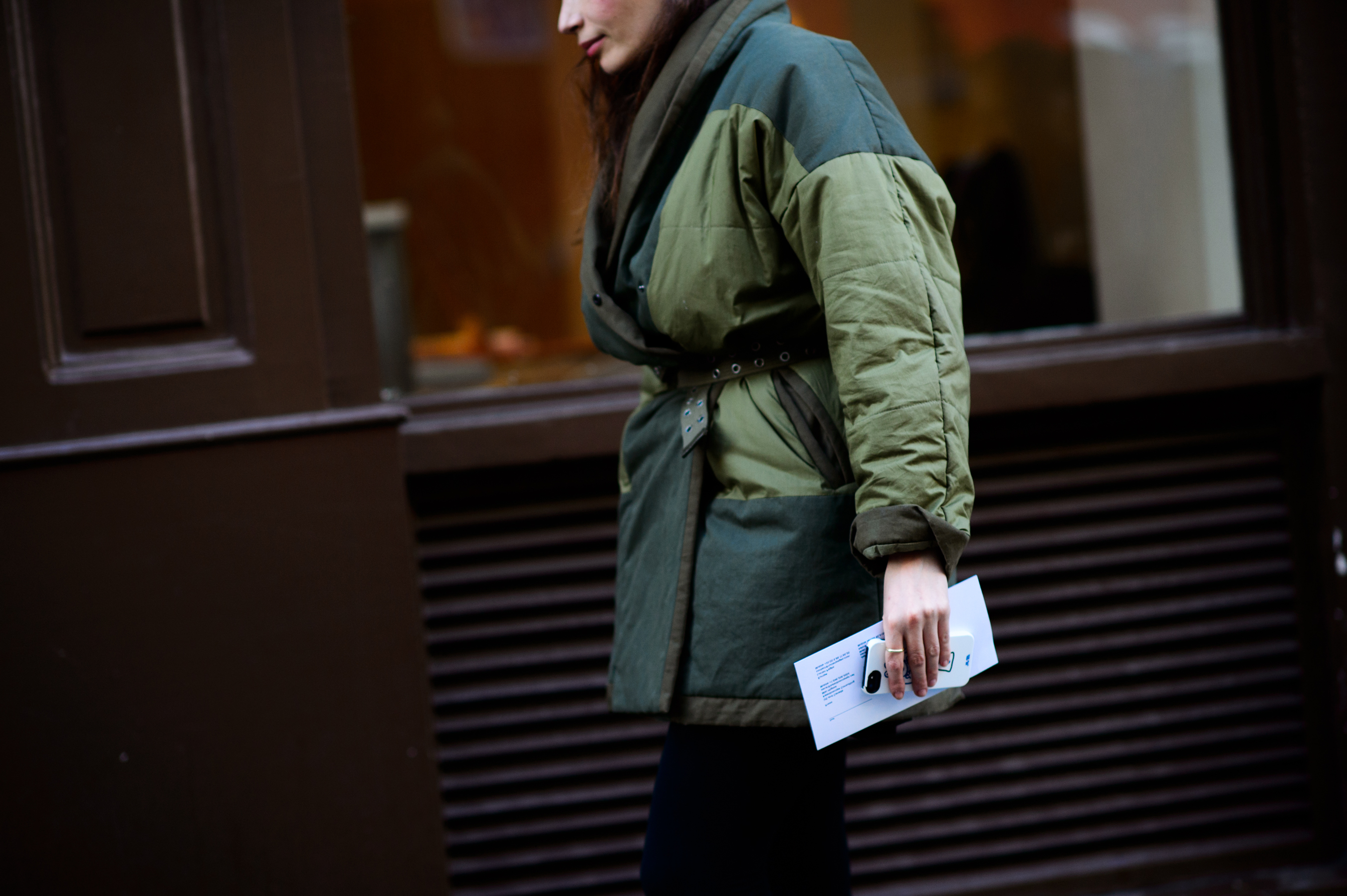 Woman wearing green warm jacket