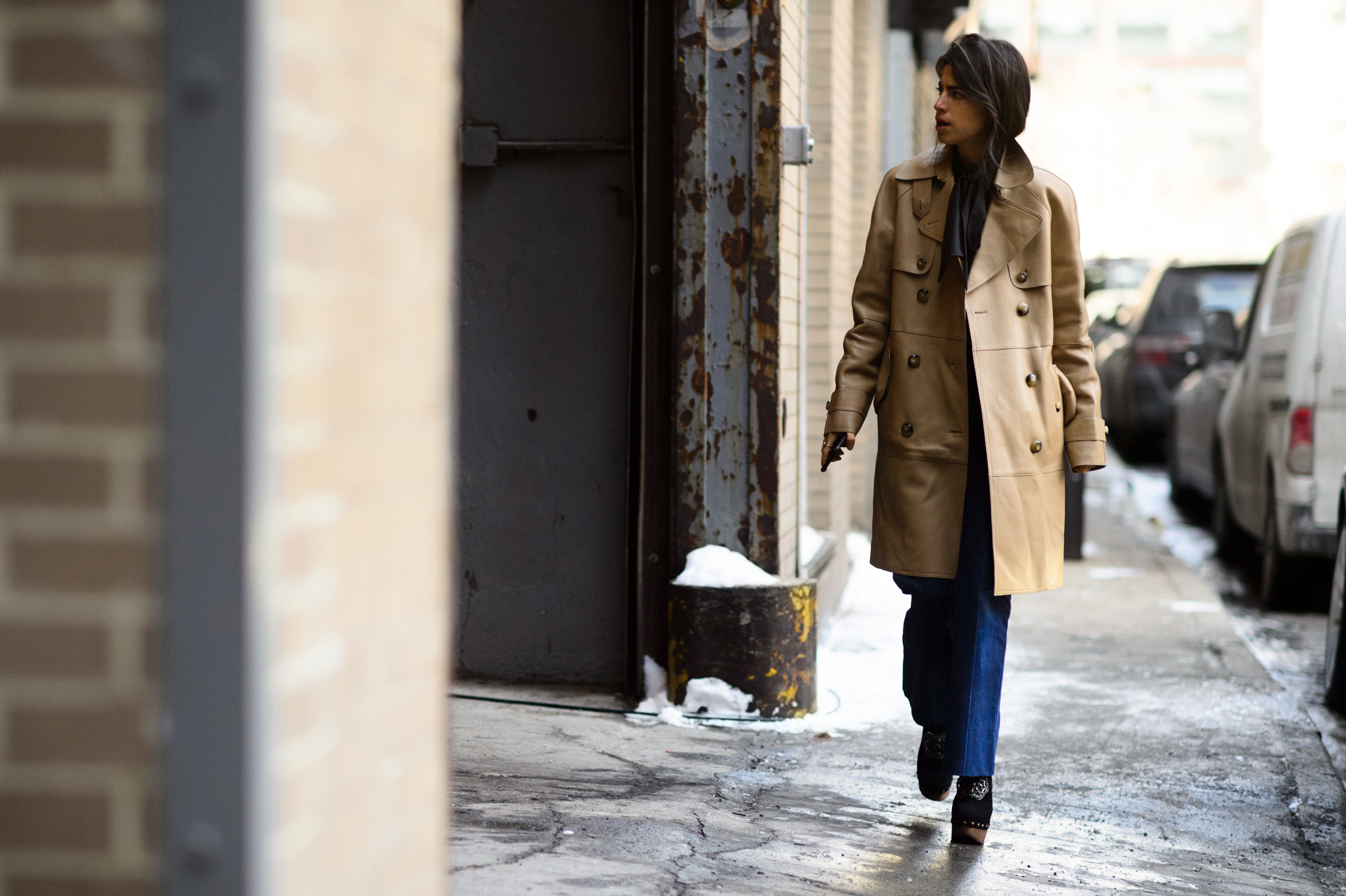 American blogger wearing beige coat