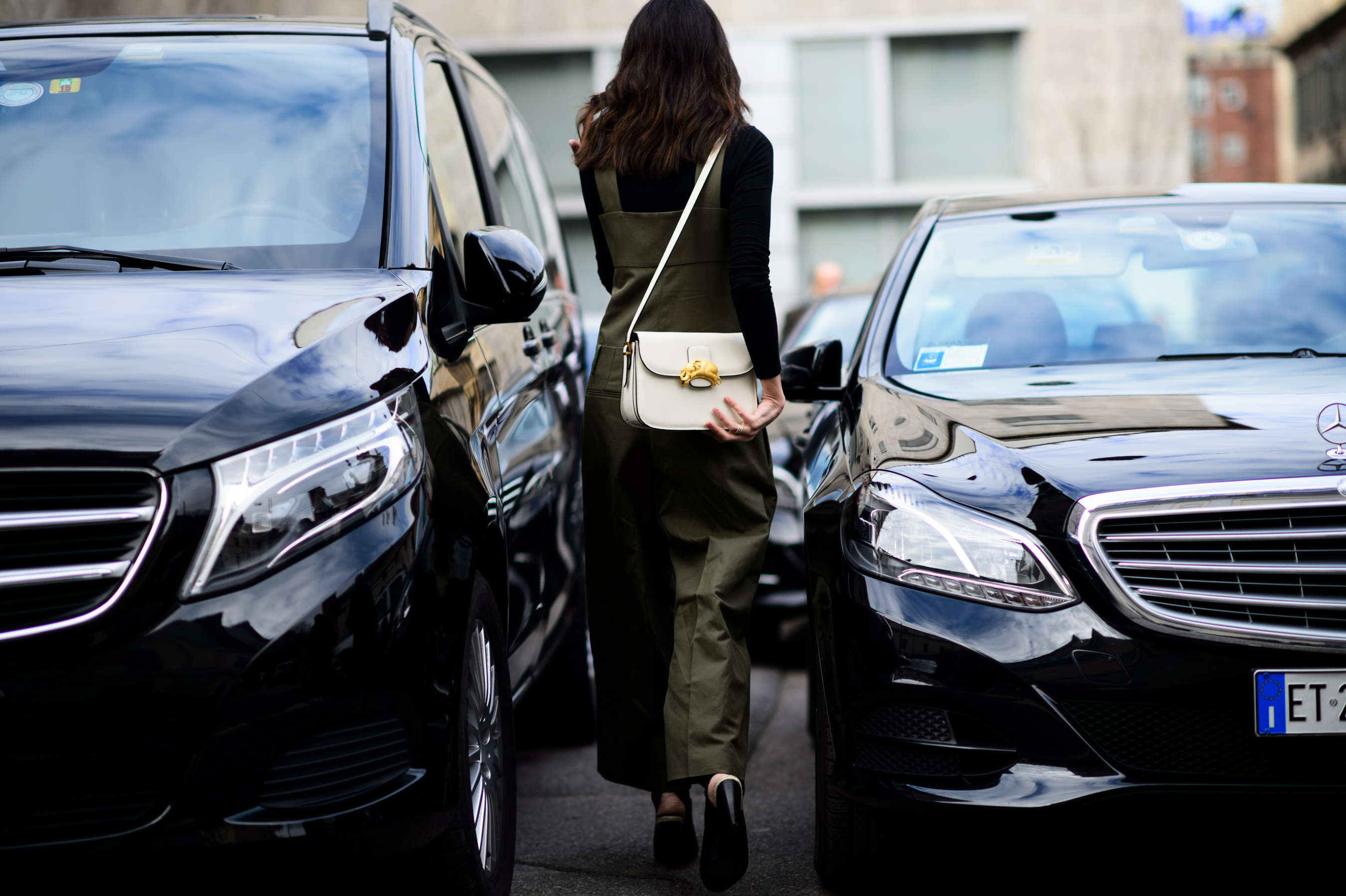 Stylebop buyer wearing green jumpsuit after the show