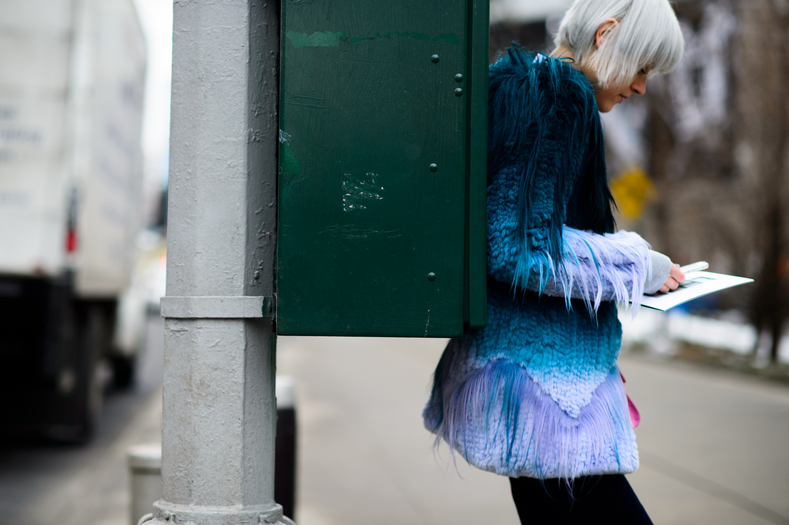 Blogger with short white hair