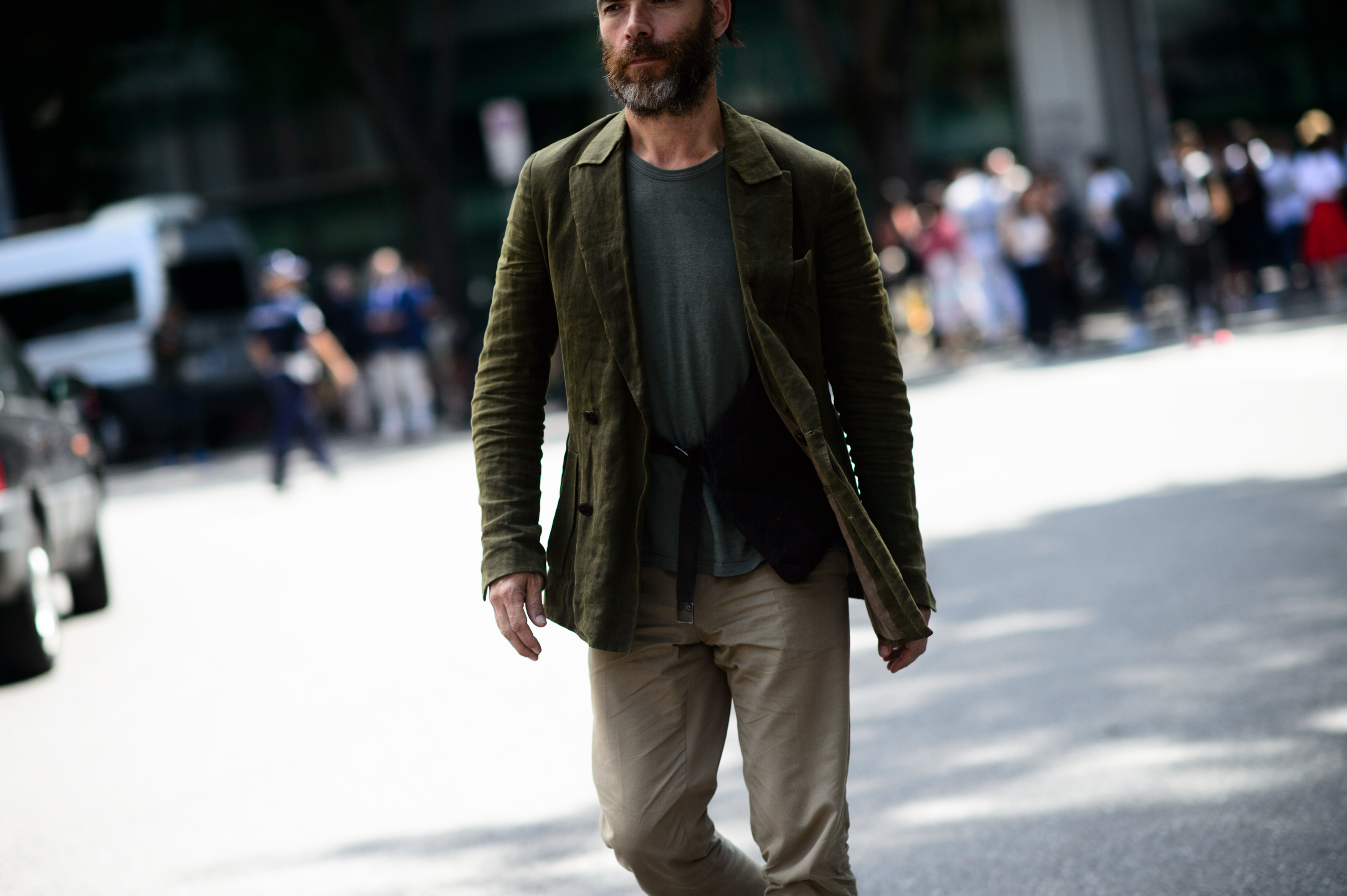 Man wearing green outfit