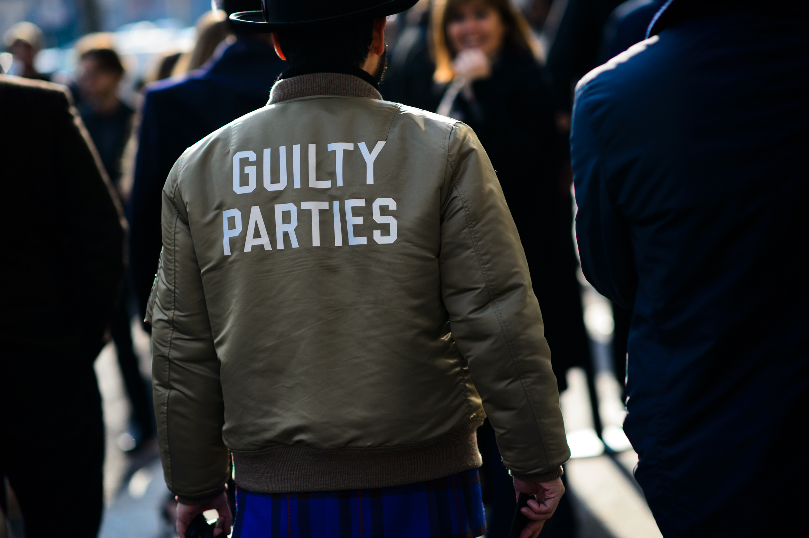 Japanese man wearing Guilty Parties bomber jacket