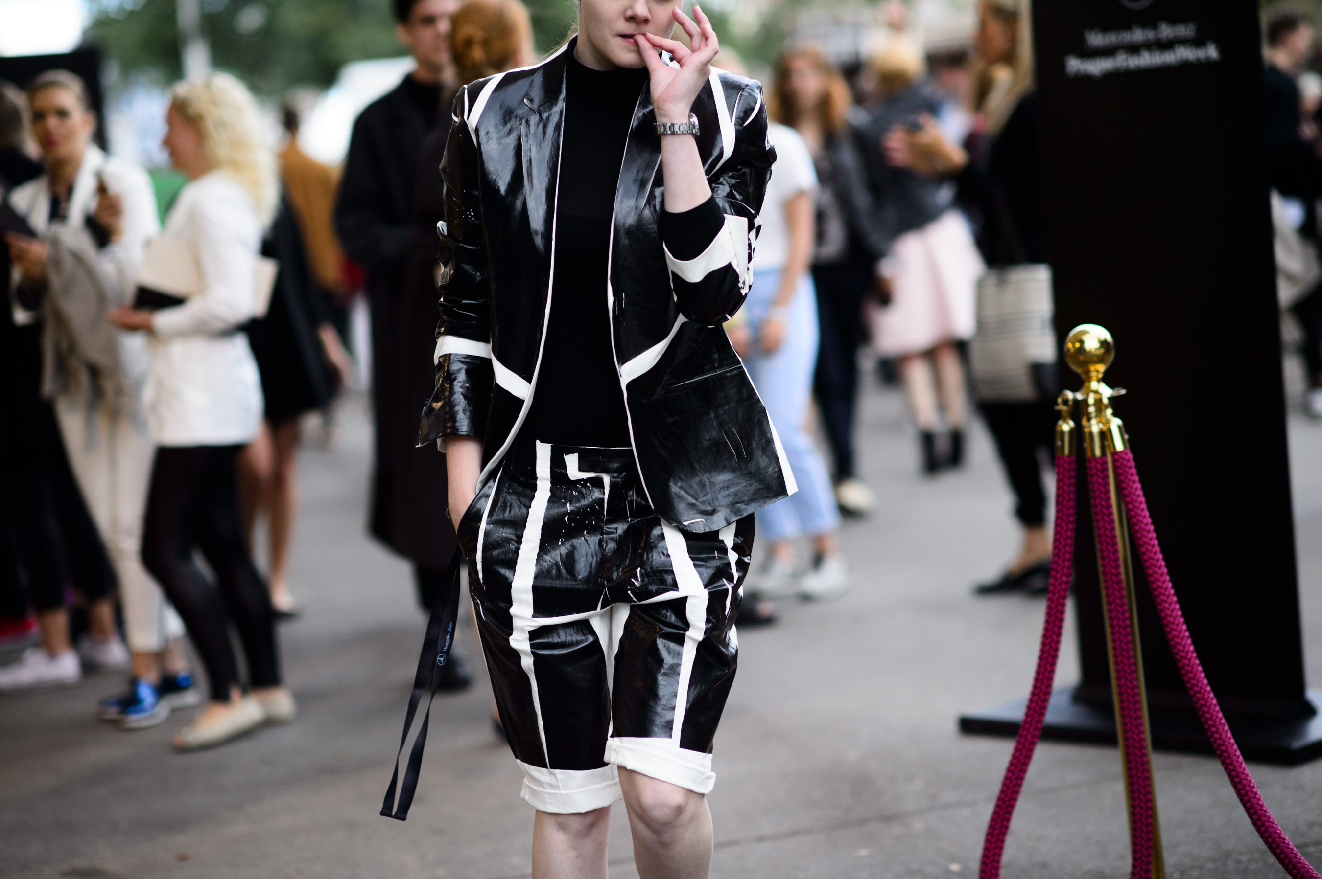 Woman wearing shiny leather outfit
