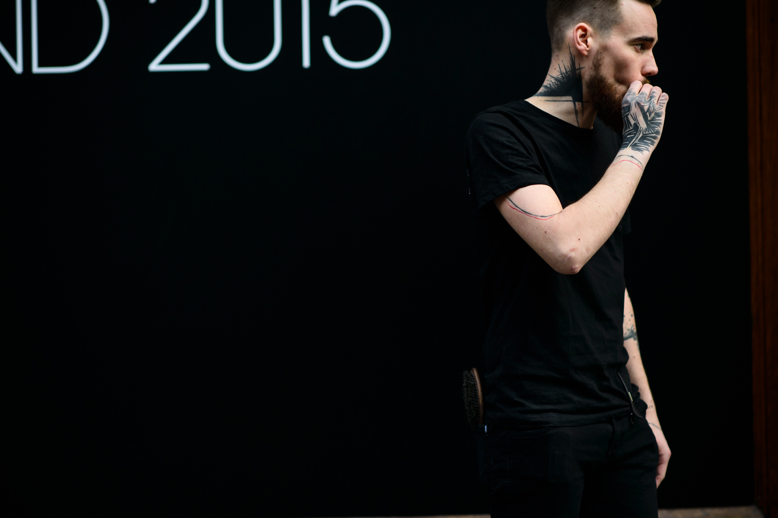 Man with tattoos smoking