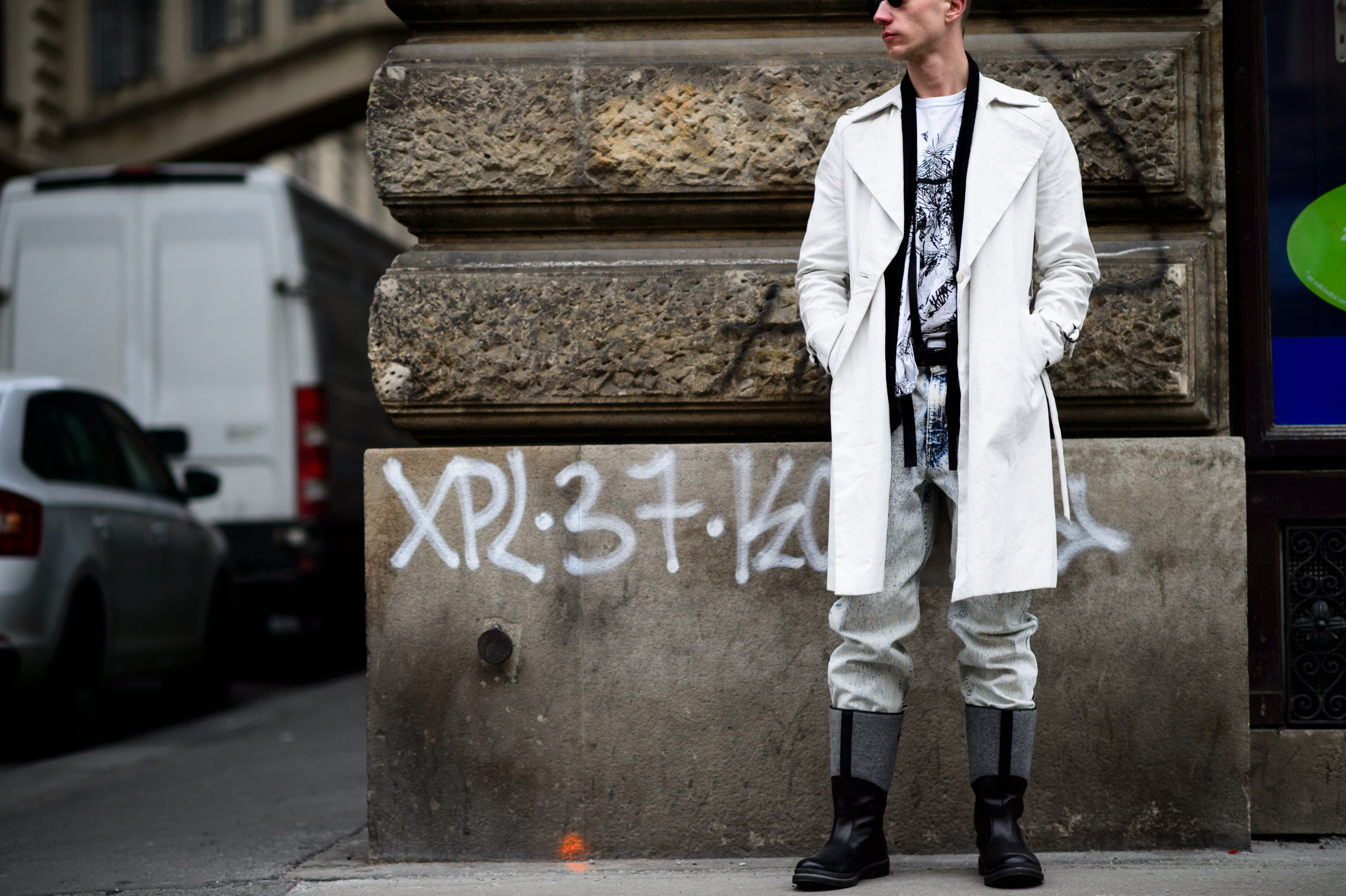 Man in white coat and boots