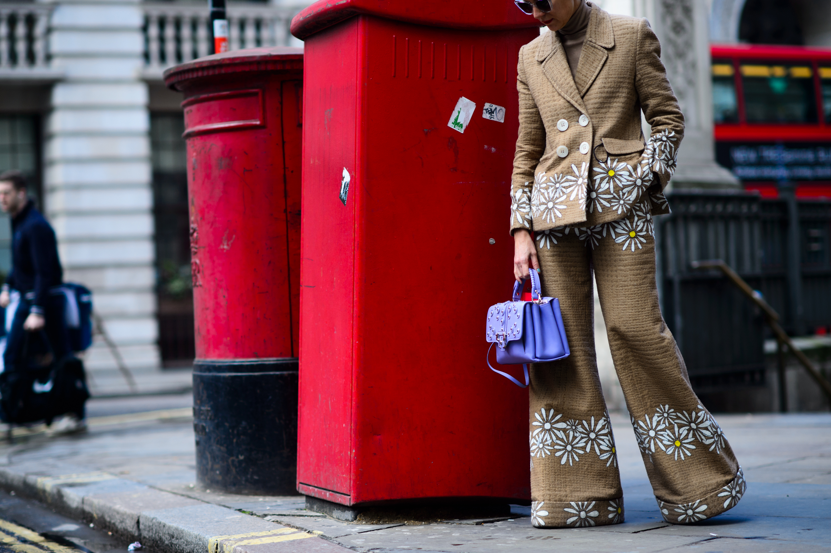 Woman wearing suit with daisy flower print
