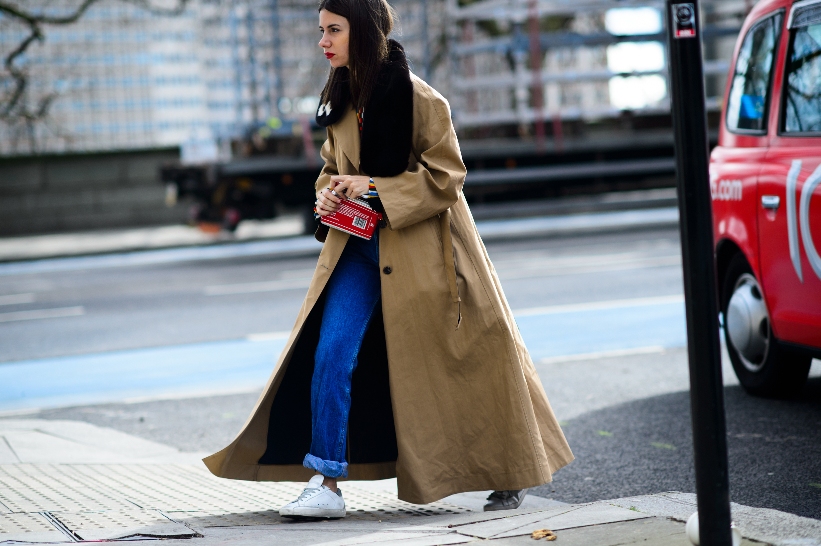 Russian buyer and stylist in long beige trench