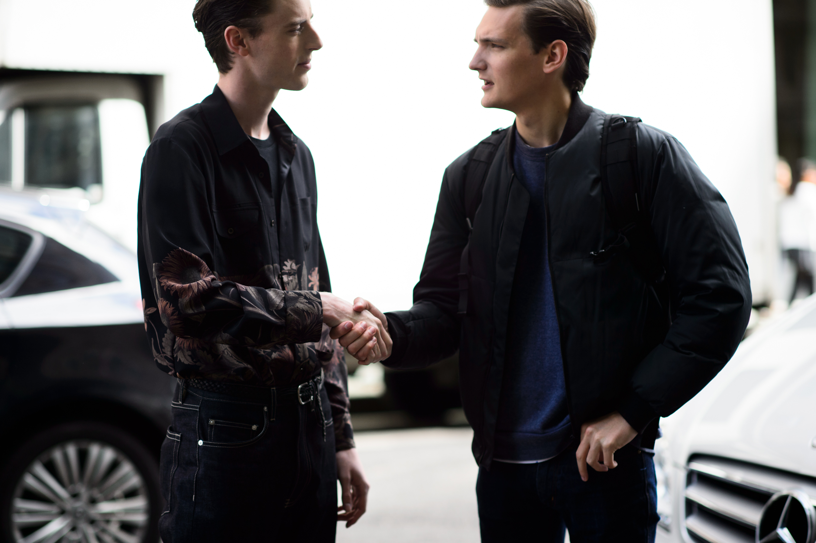 Two male models after the show