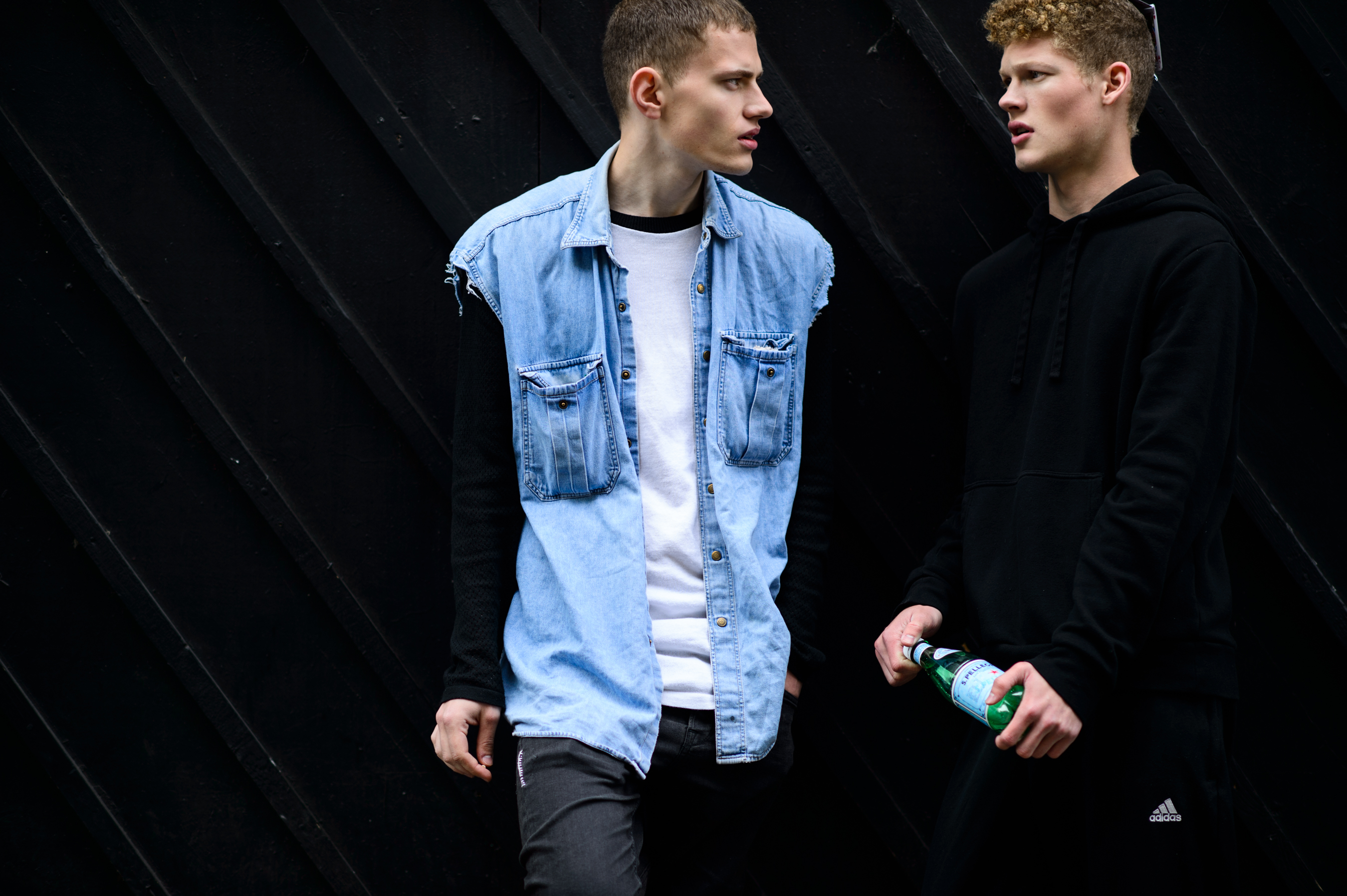 Two male models after the show