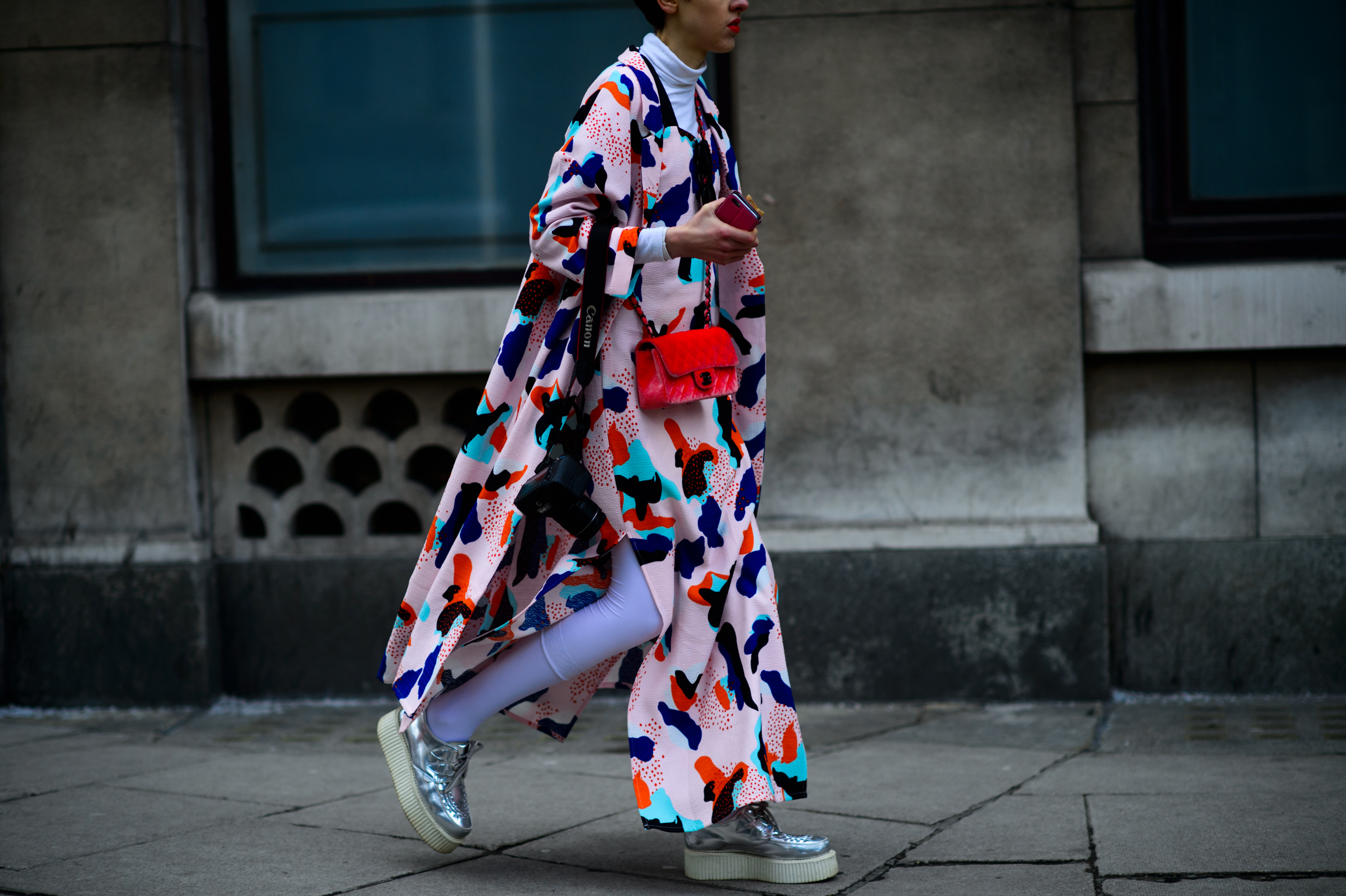 Woman wearing colorful cape