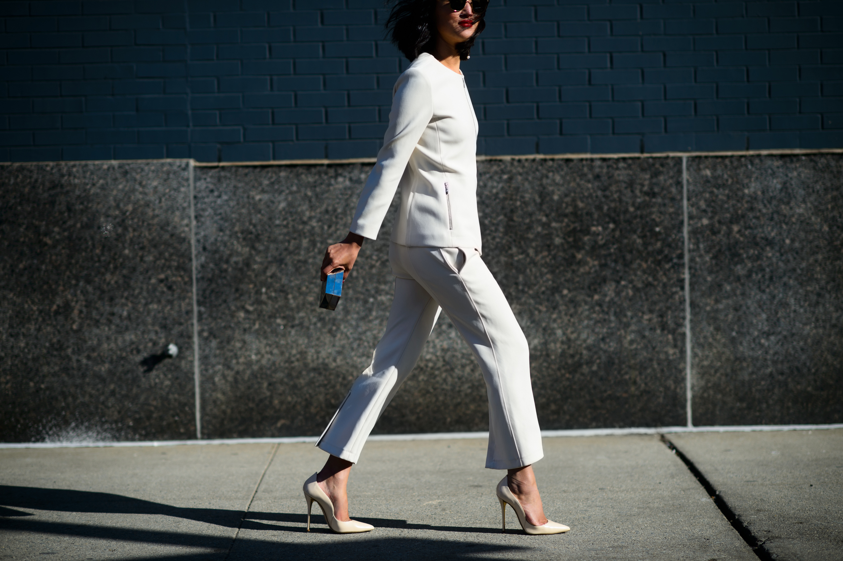 Woman wearing white suit