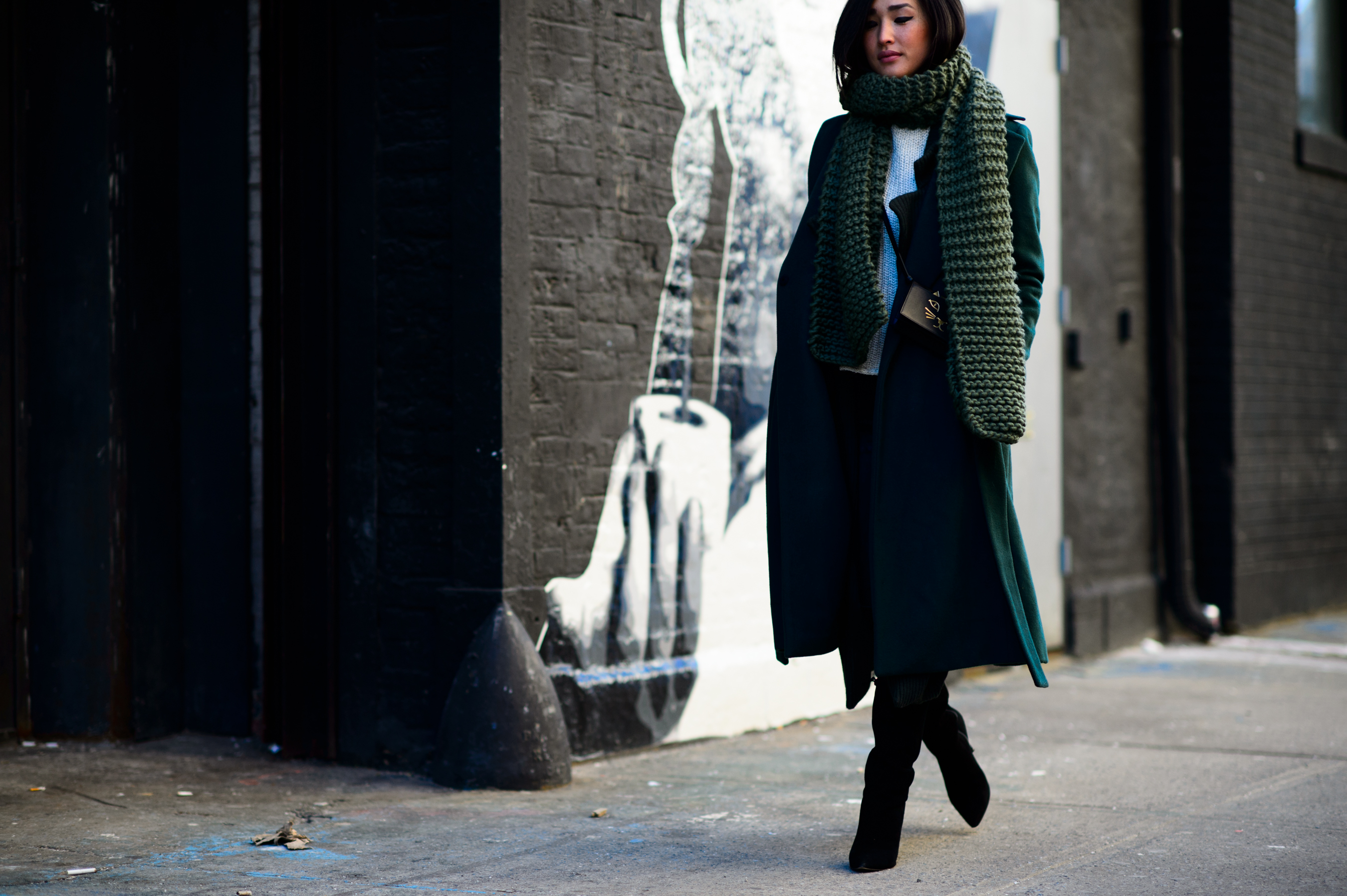 Woman wearing green scarf