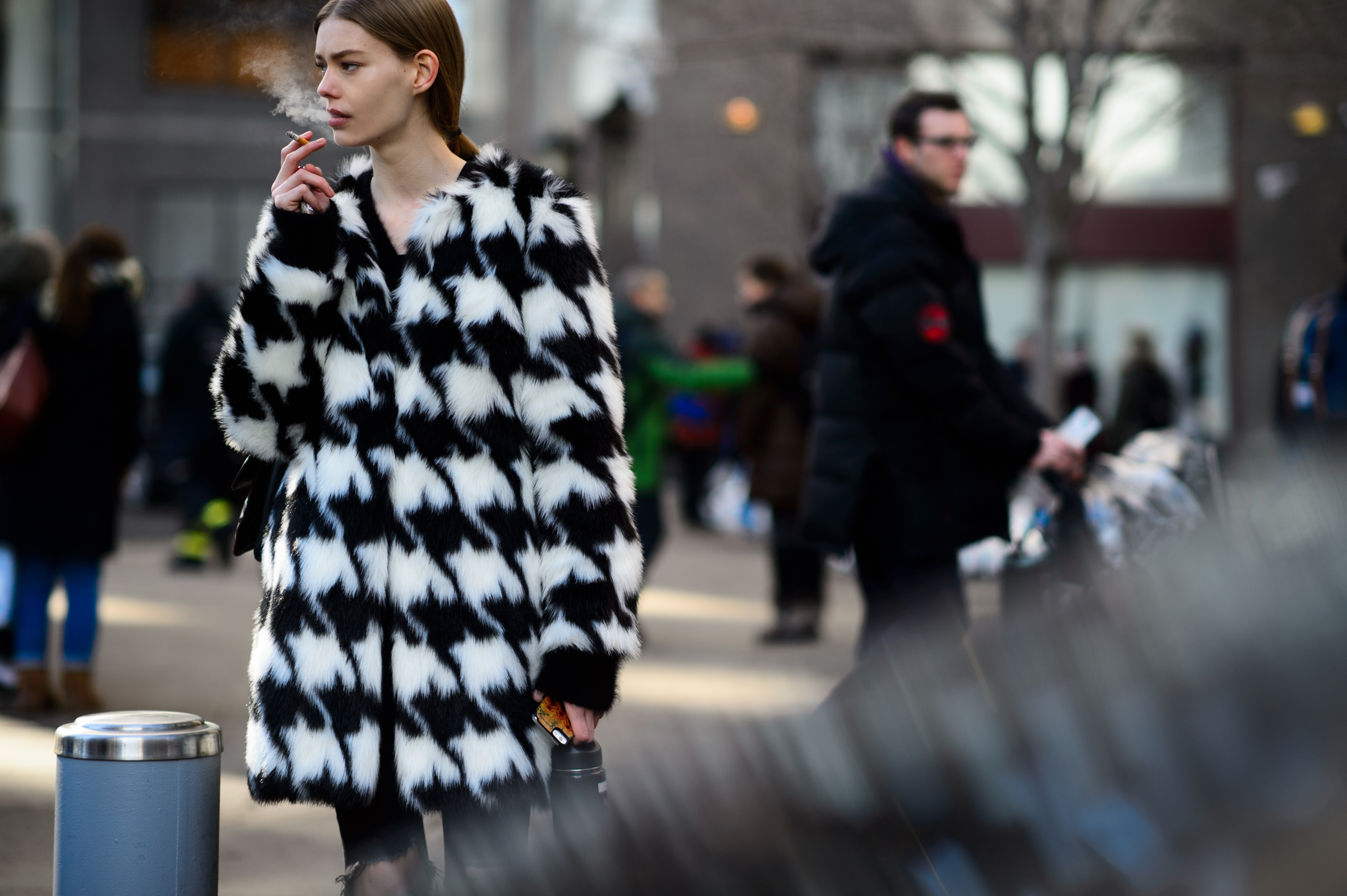 Model wearing black and white coat