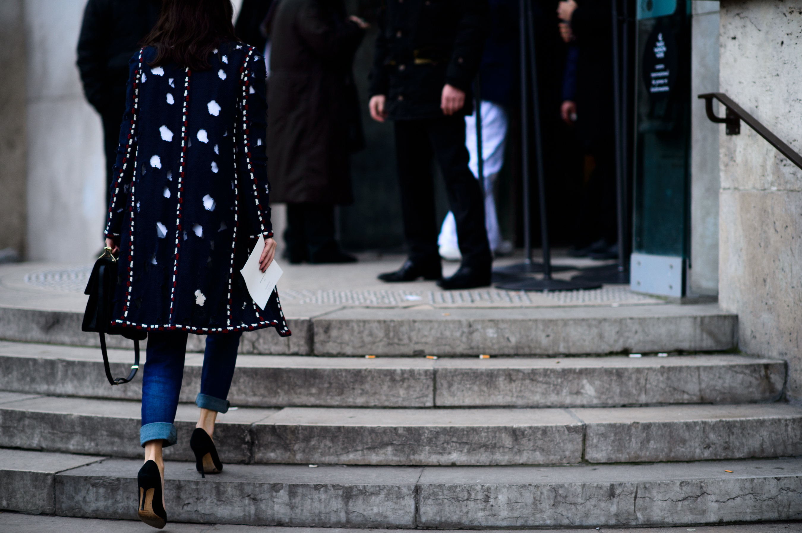 Woman walking up the stairs