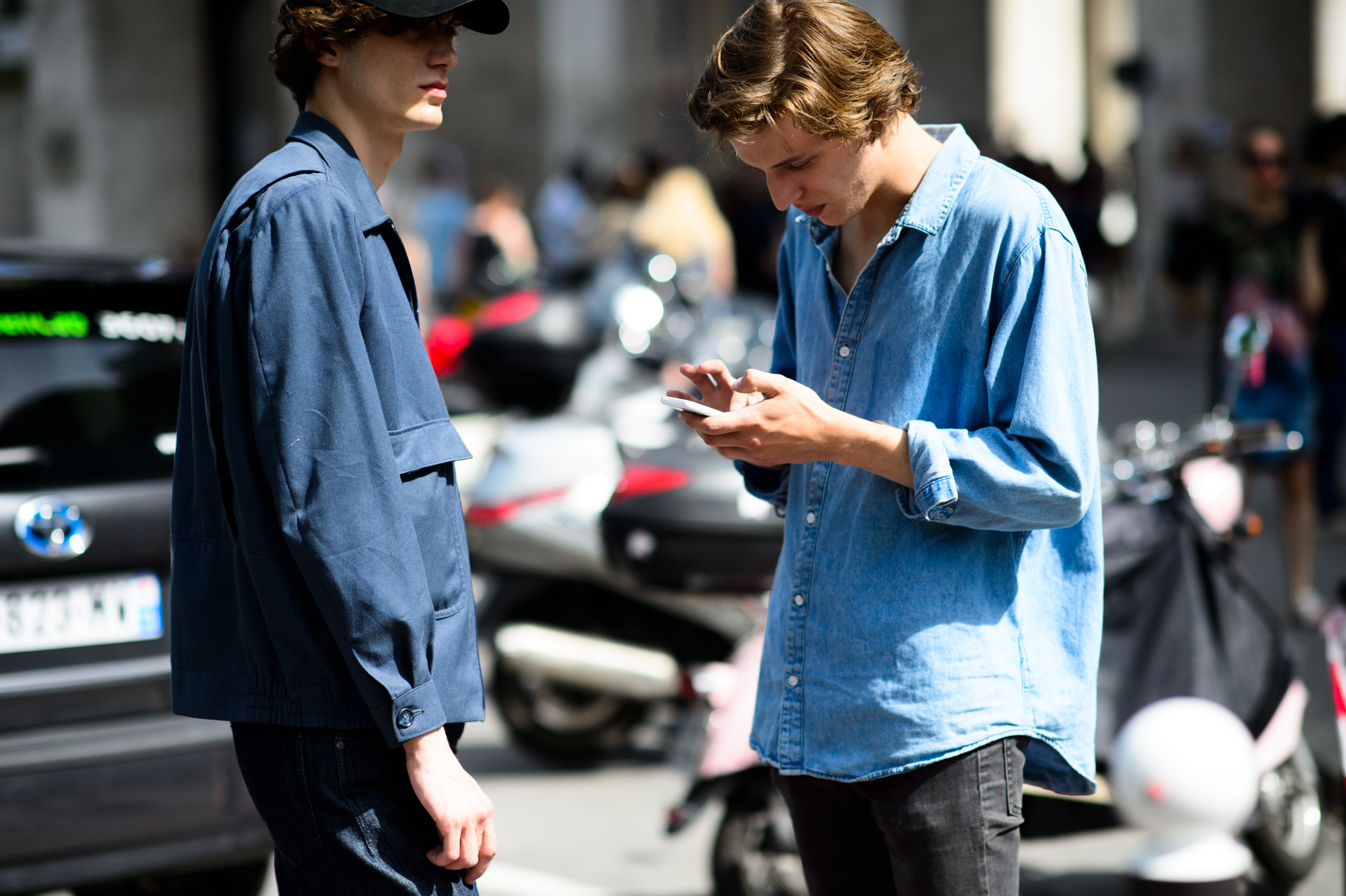 Two male models after the show
