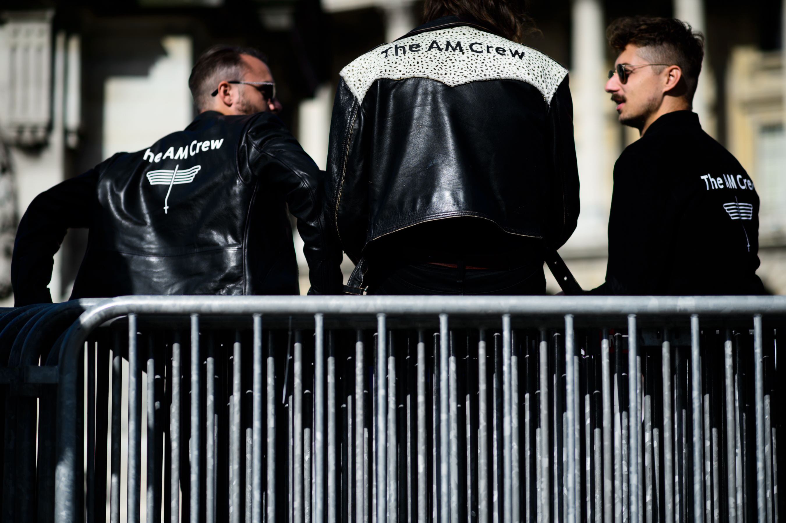 Three guys wearing biker jackets