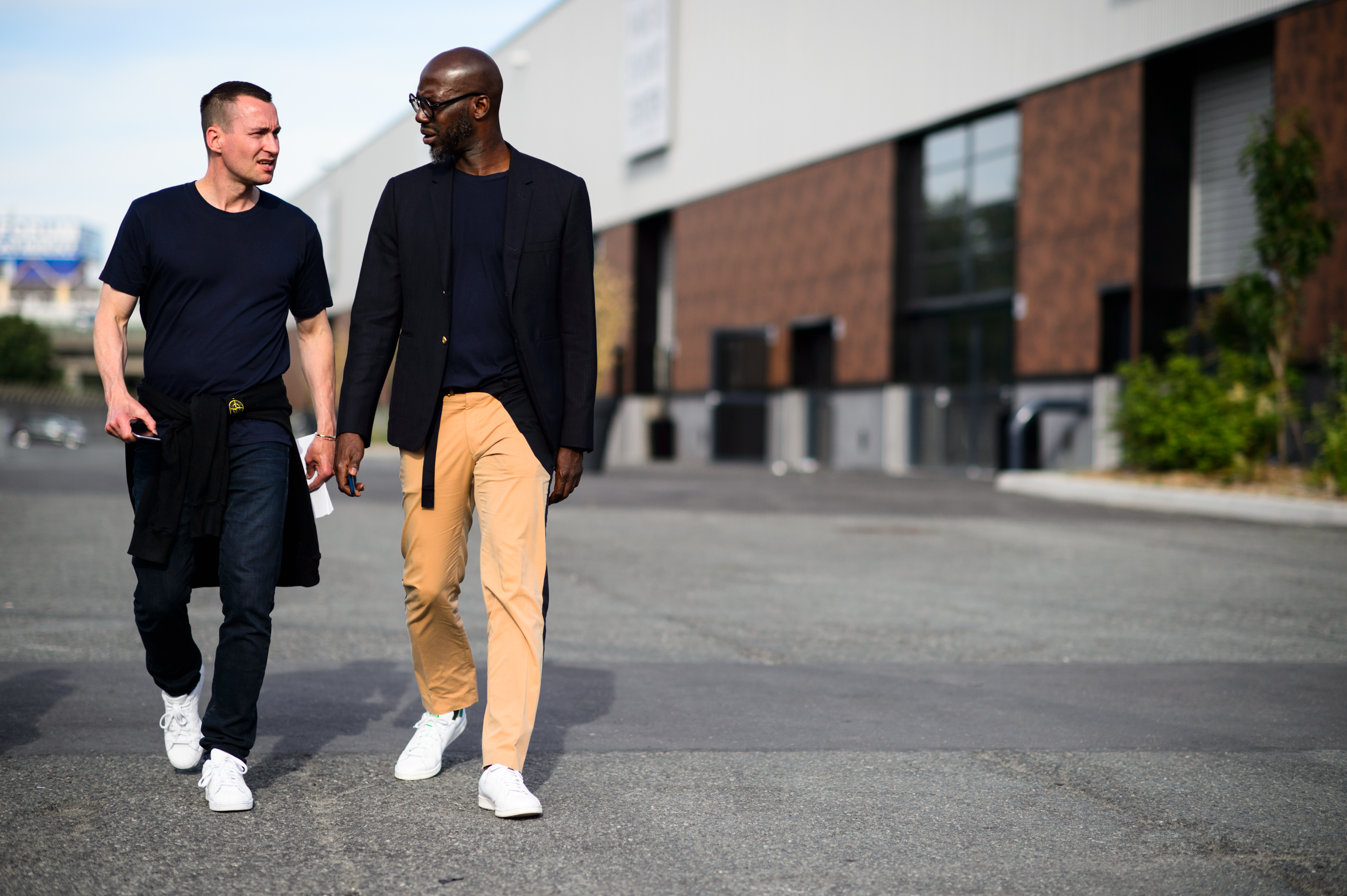 Two men leaving Thom Browne show