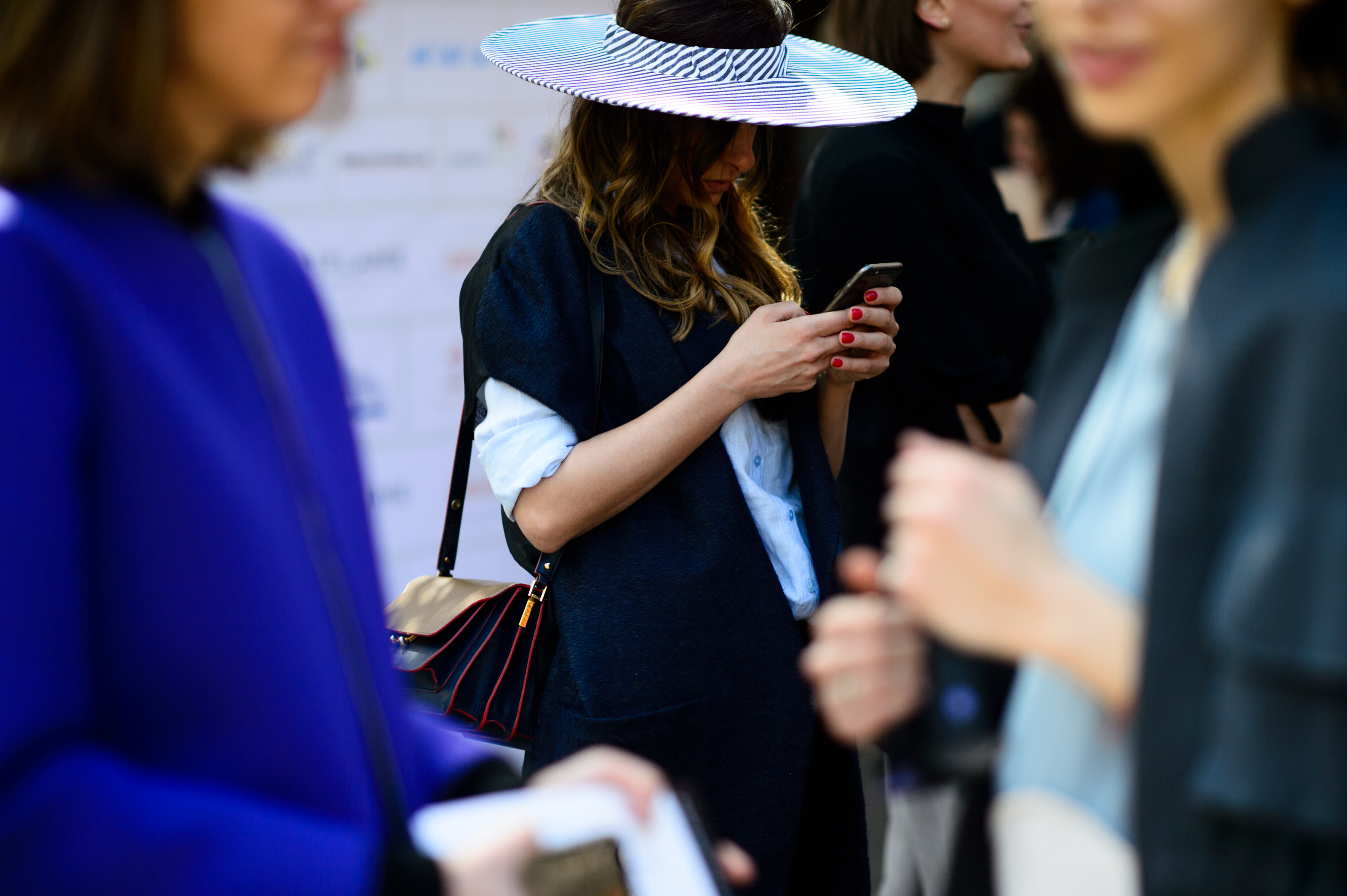 Woman wearing hat without a top in Georgia