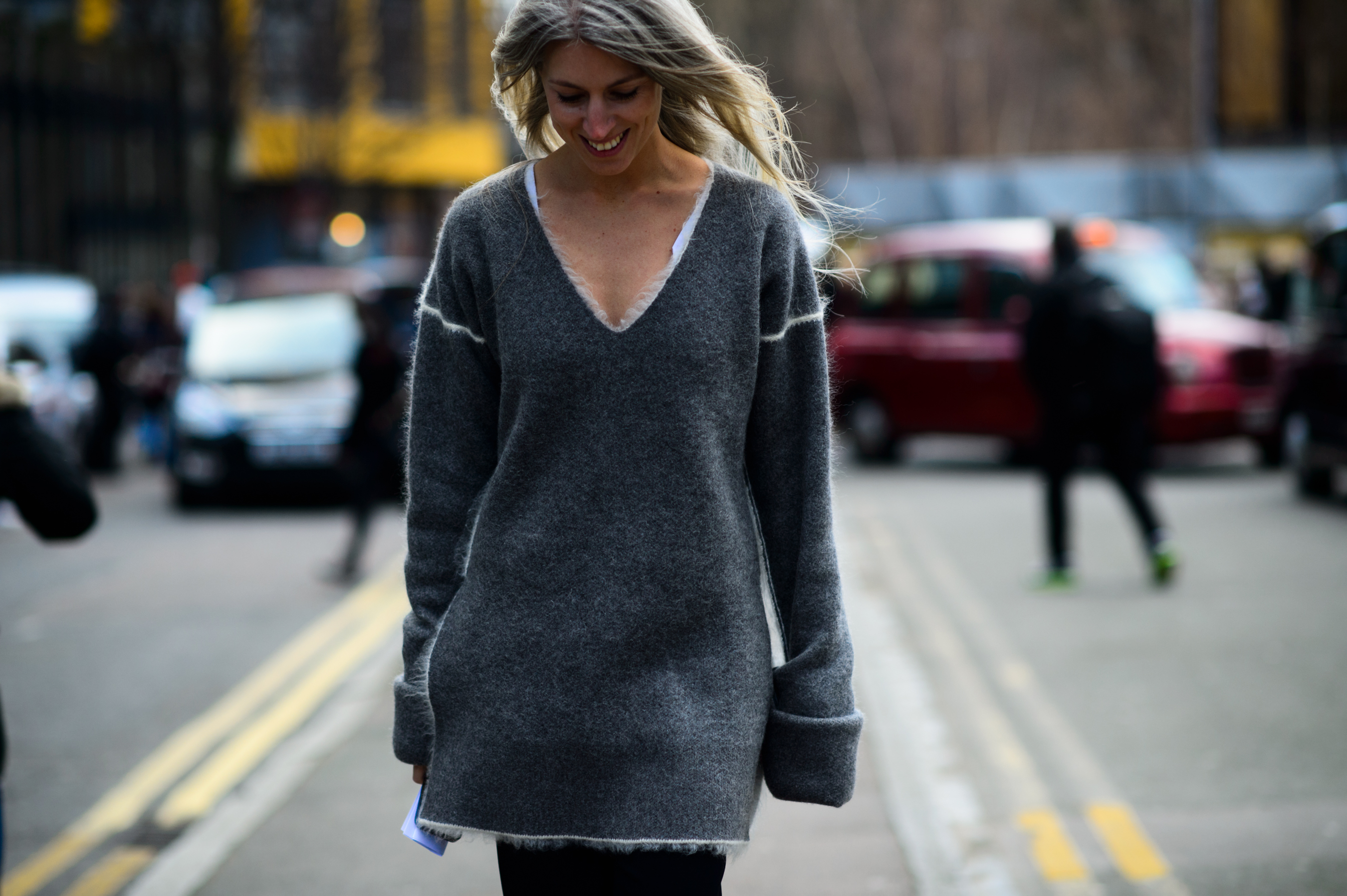 British Vogue editor wearing grey sweater