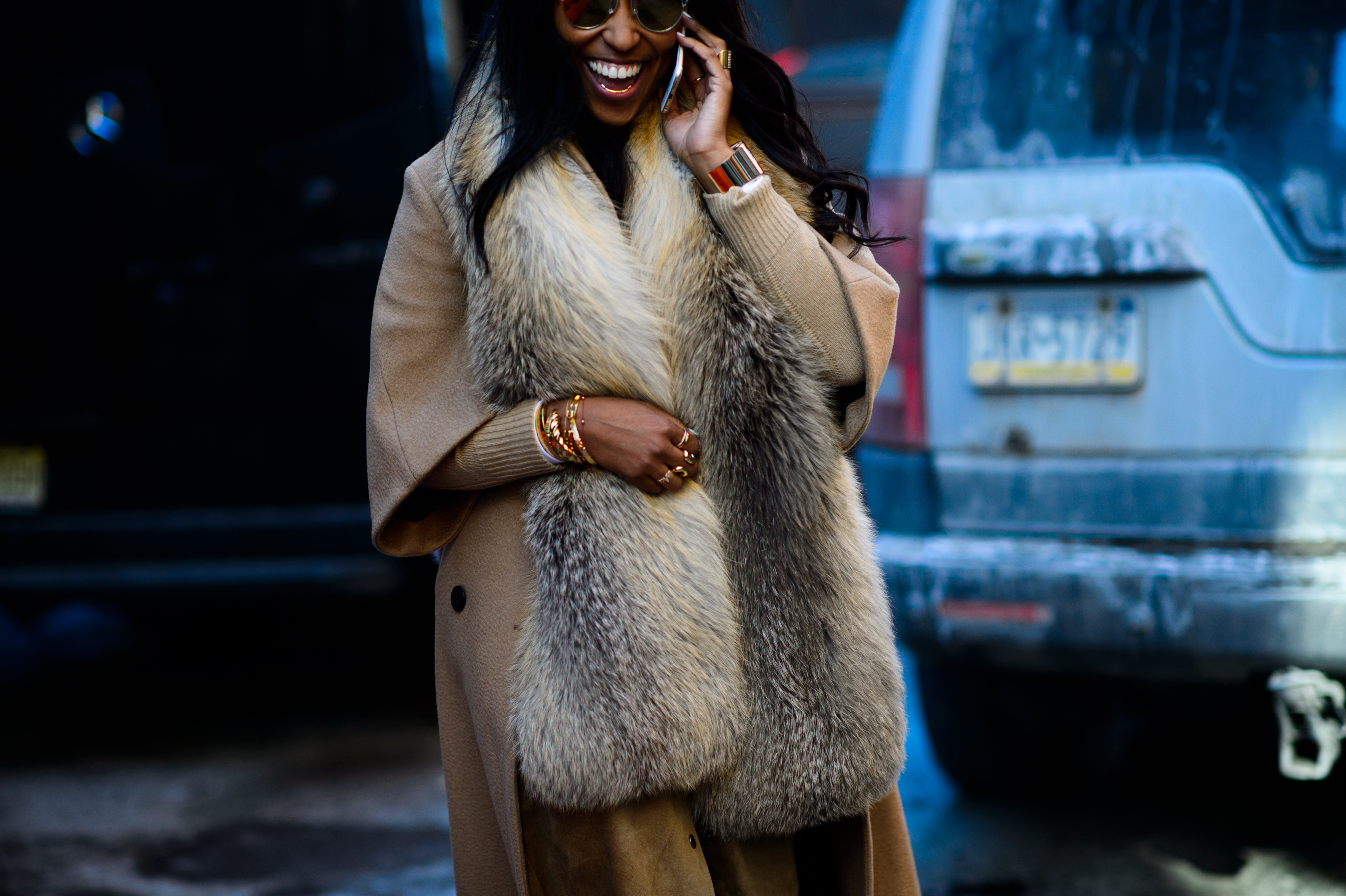 Woman wearing furry scarf