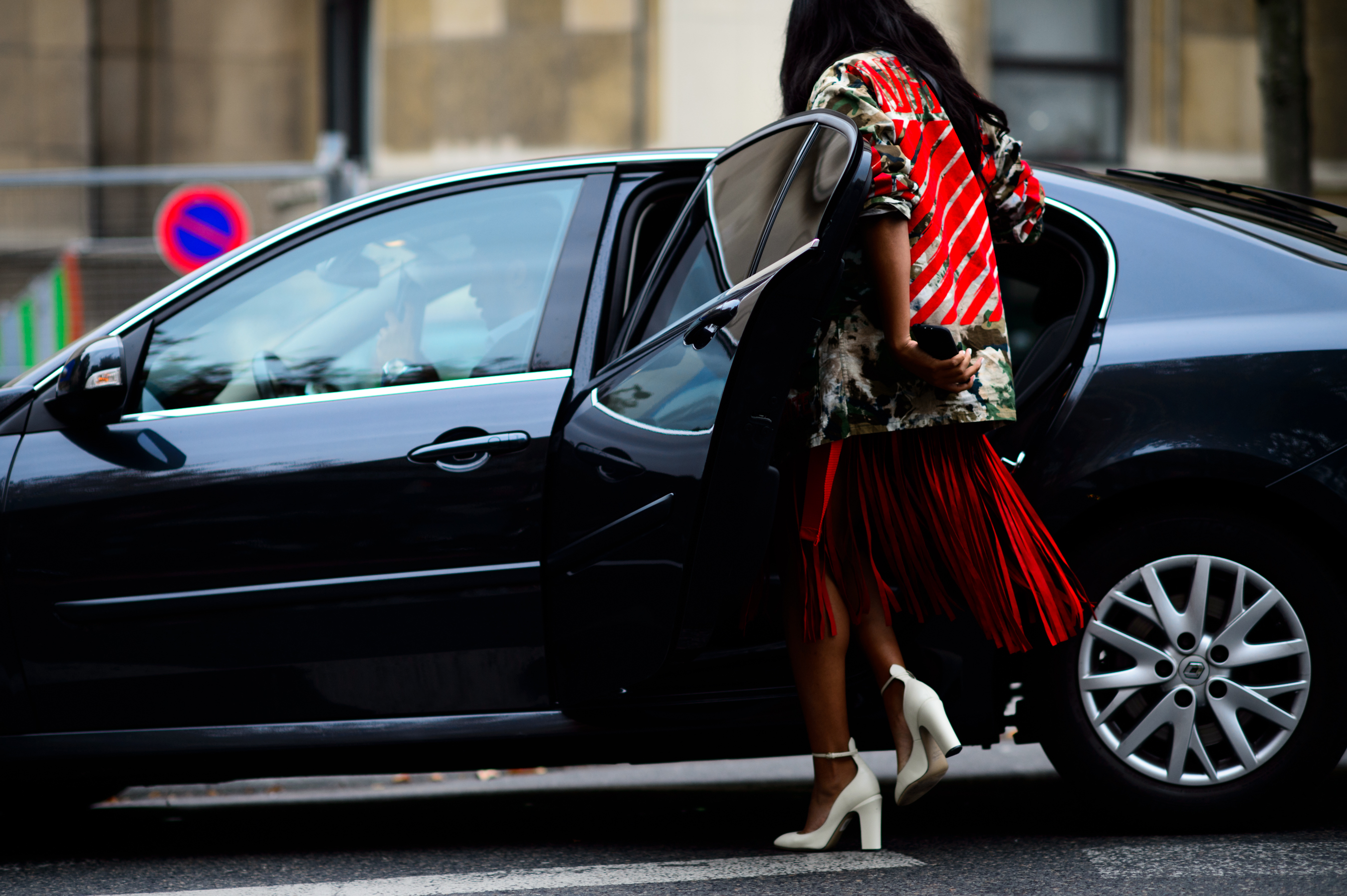 Woman getting in the car