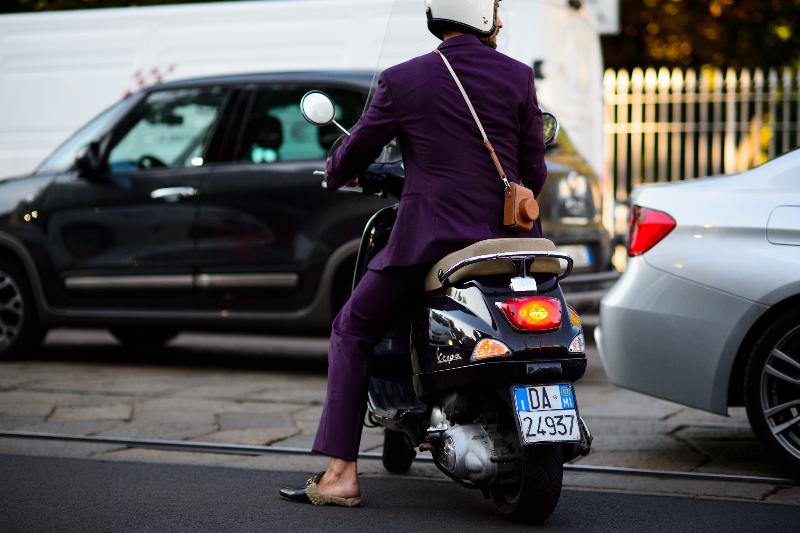 Italian journalist on a scooter