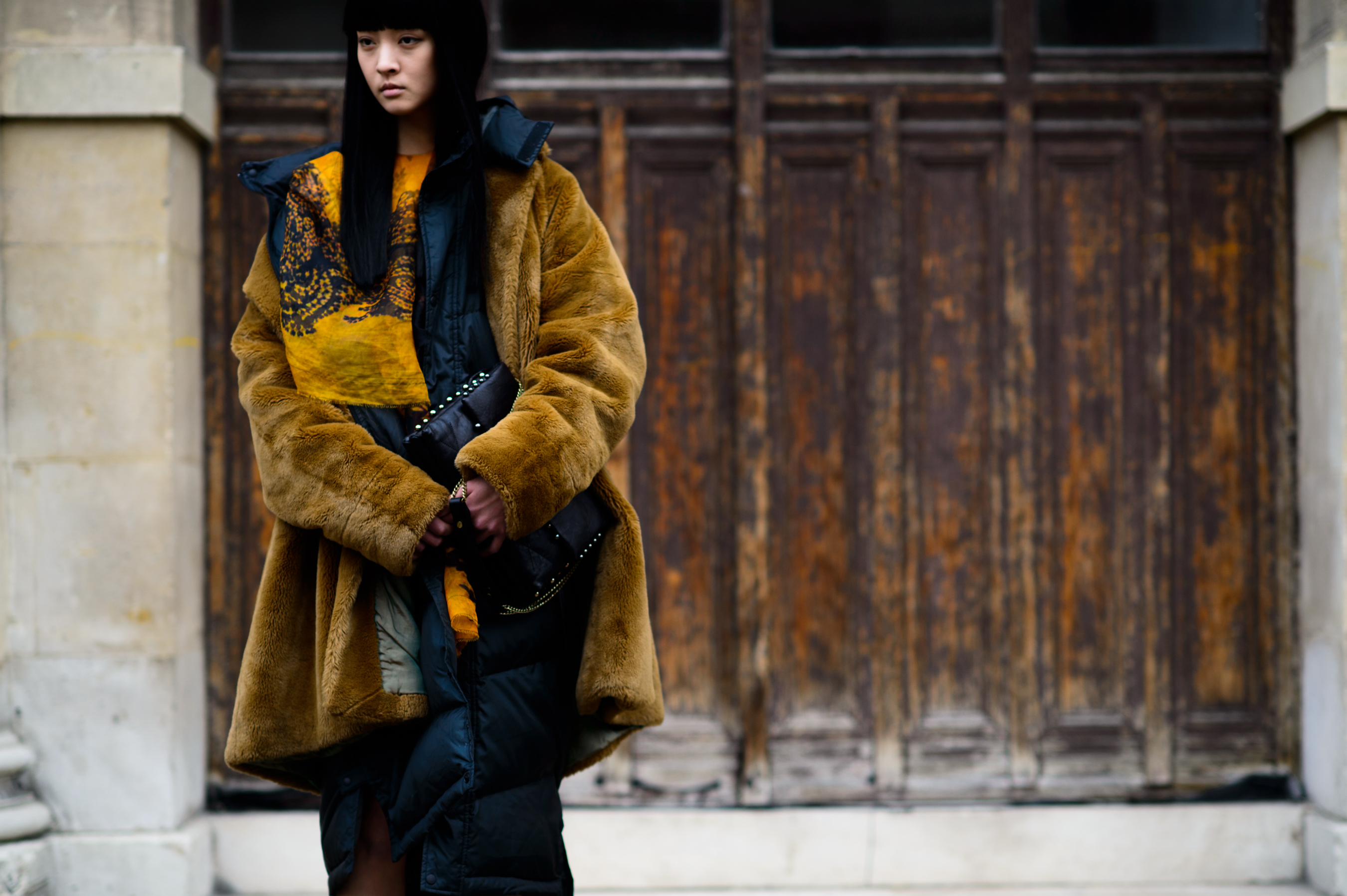 Korean model wearing warm coat before Lanvin