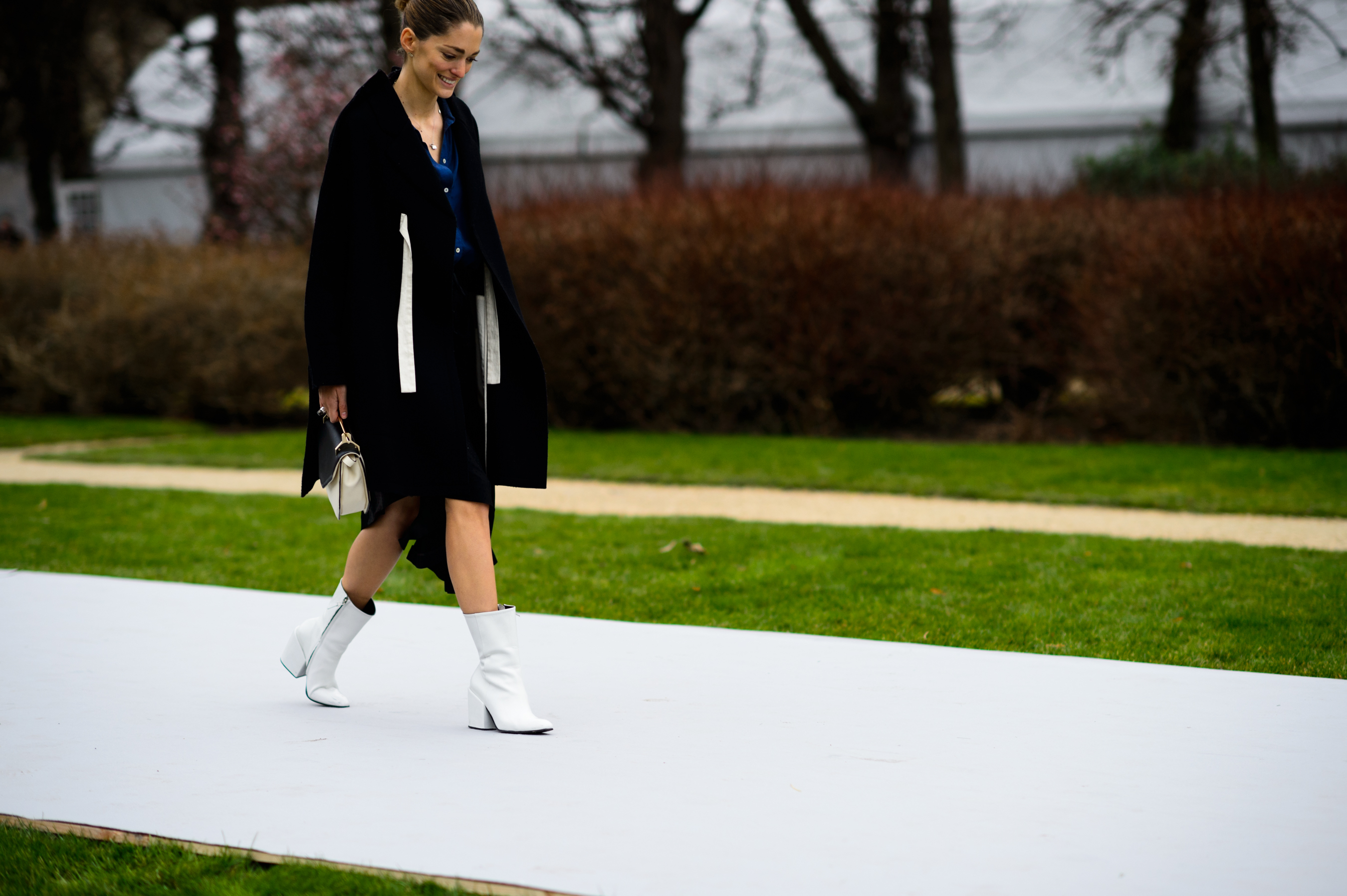 Argentinian blogger wearing white boots