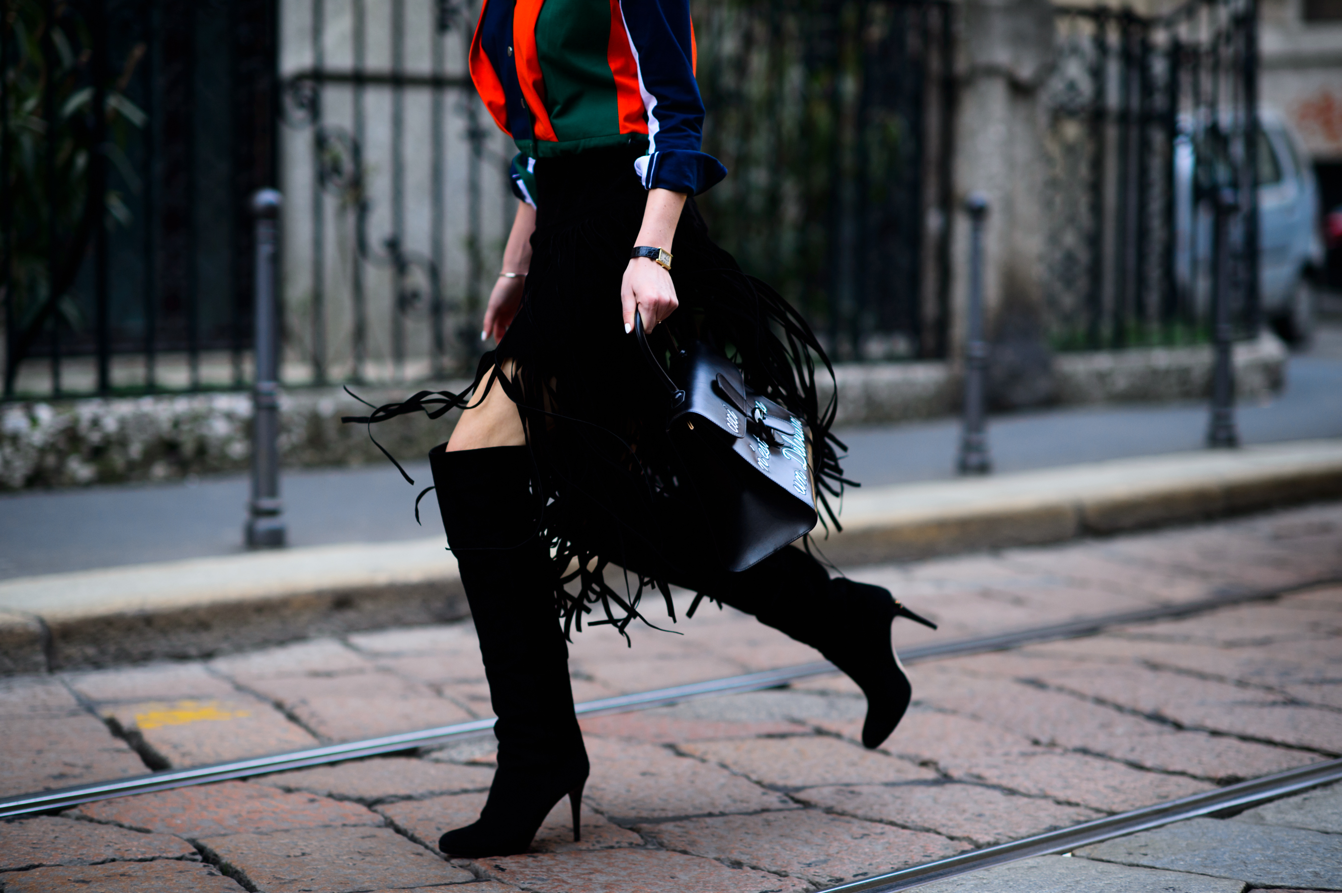 Blogger wearing high boots