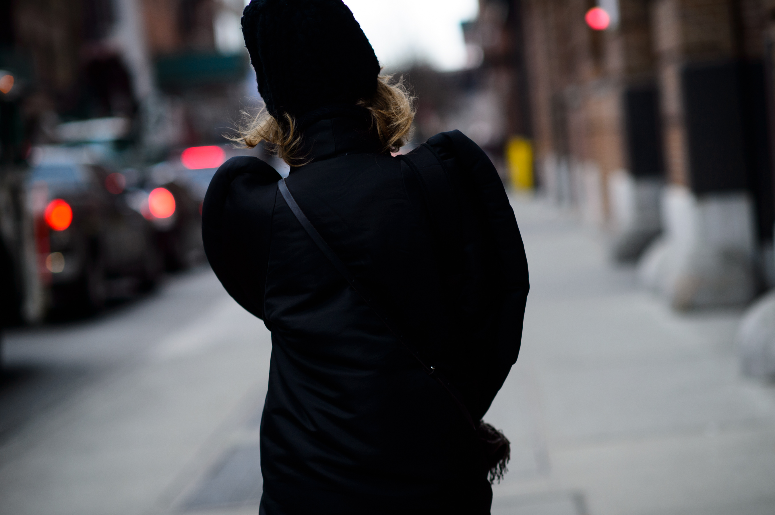 Russian stylist wearing hat and oversized shoulders jacket