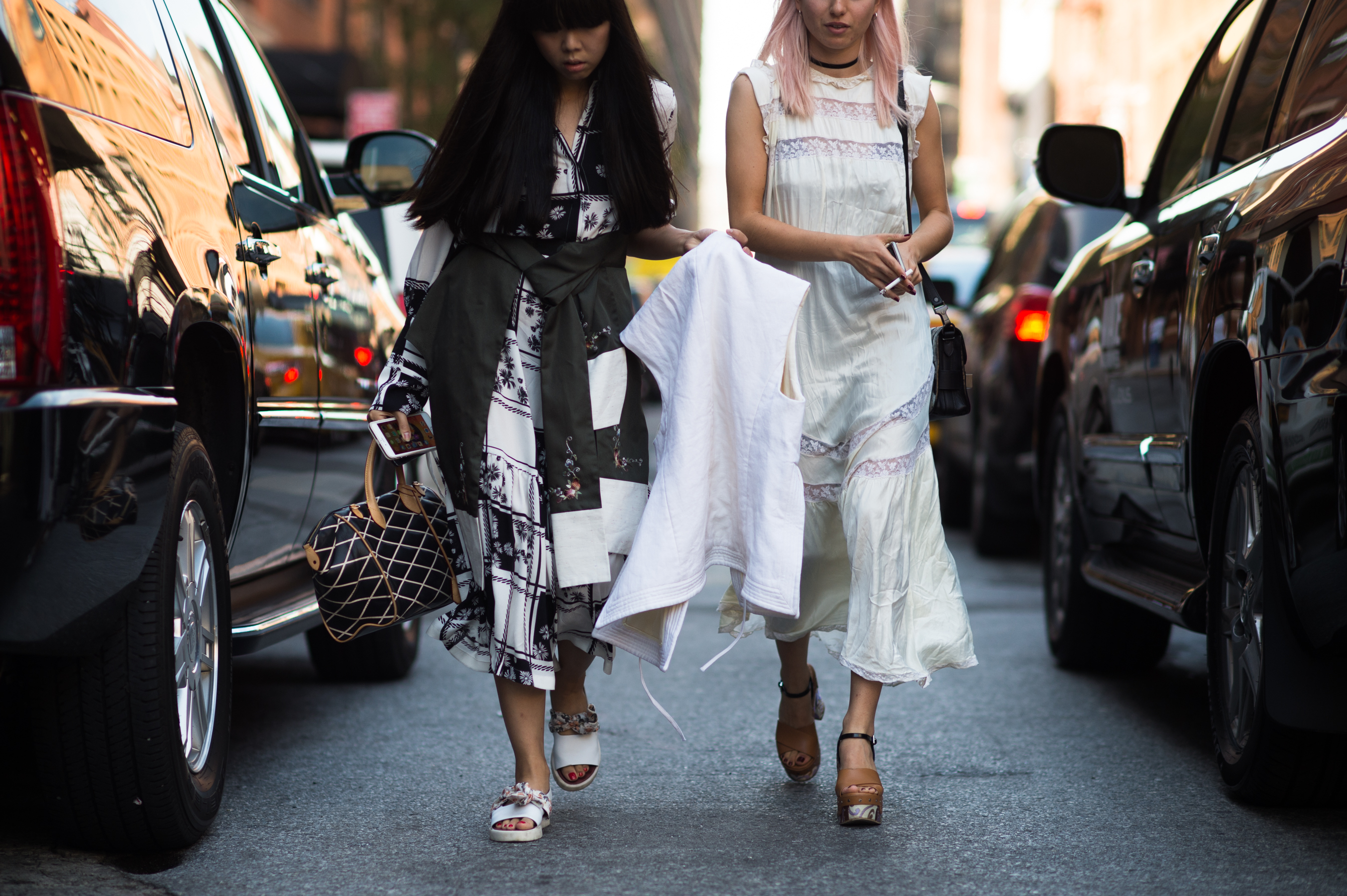 Two British women wearing dresses