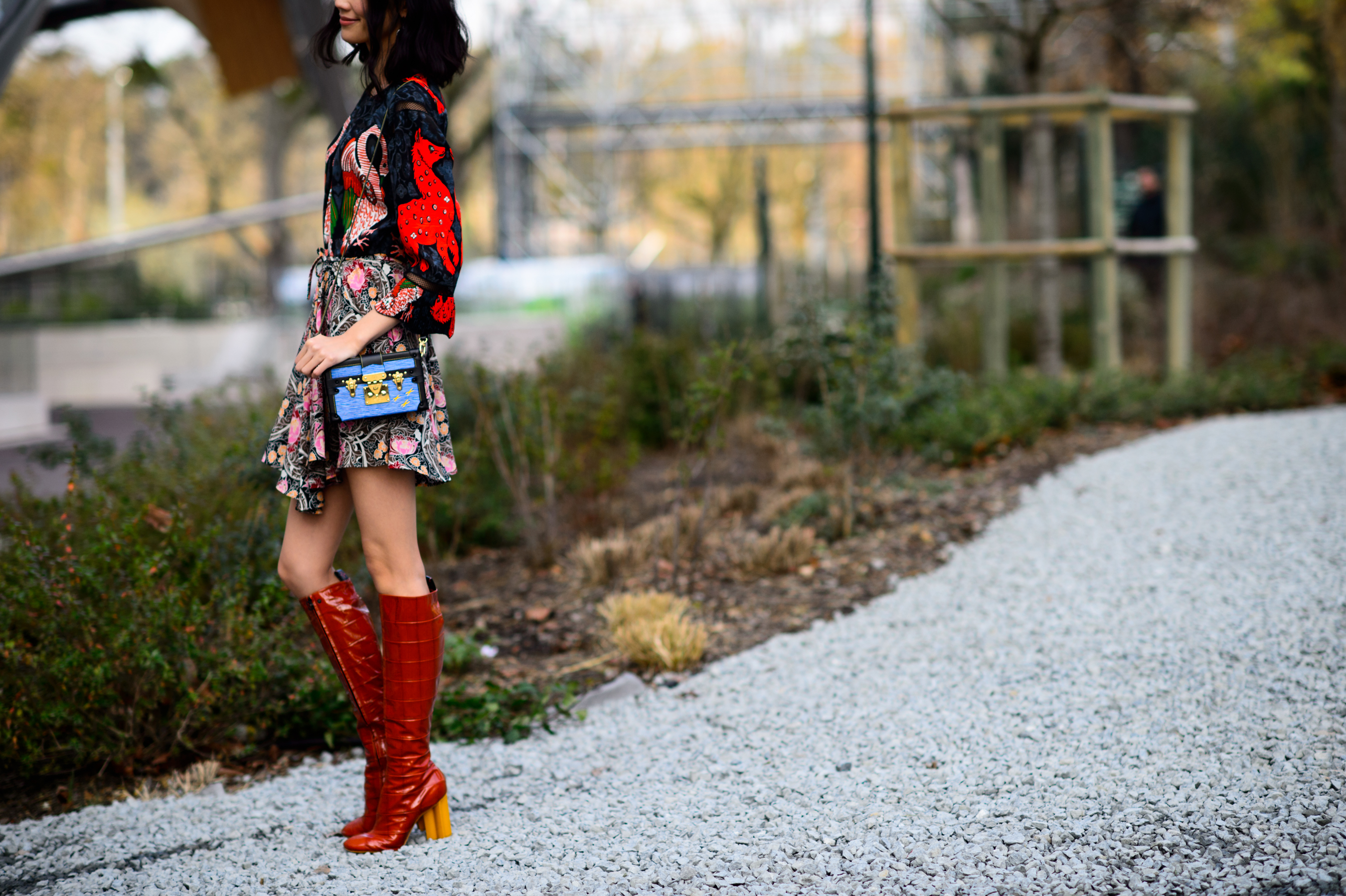 Woman wearing short dress and boots