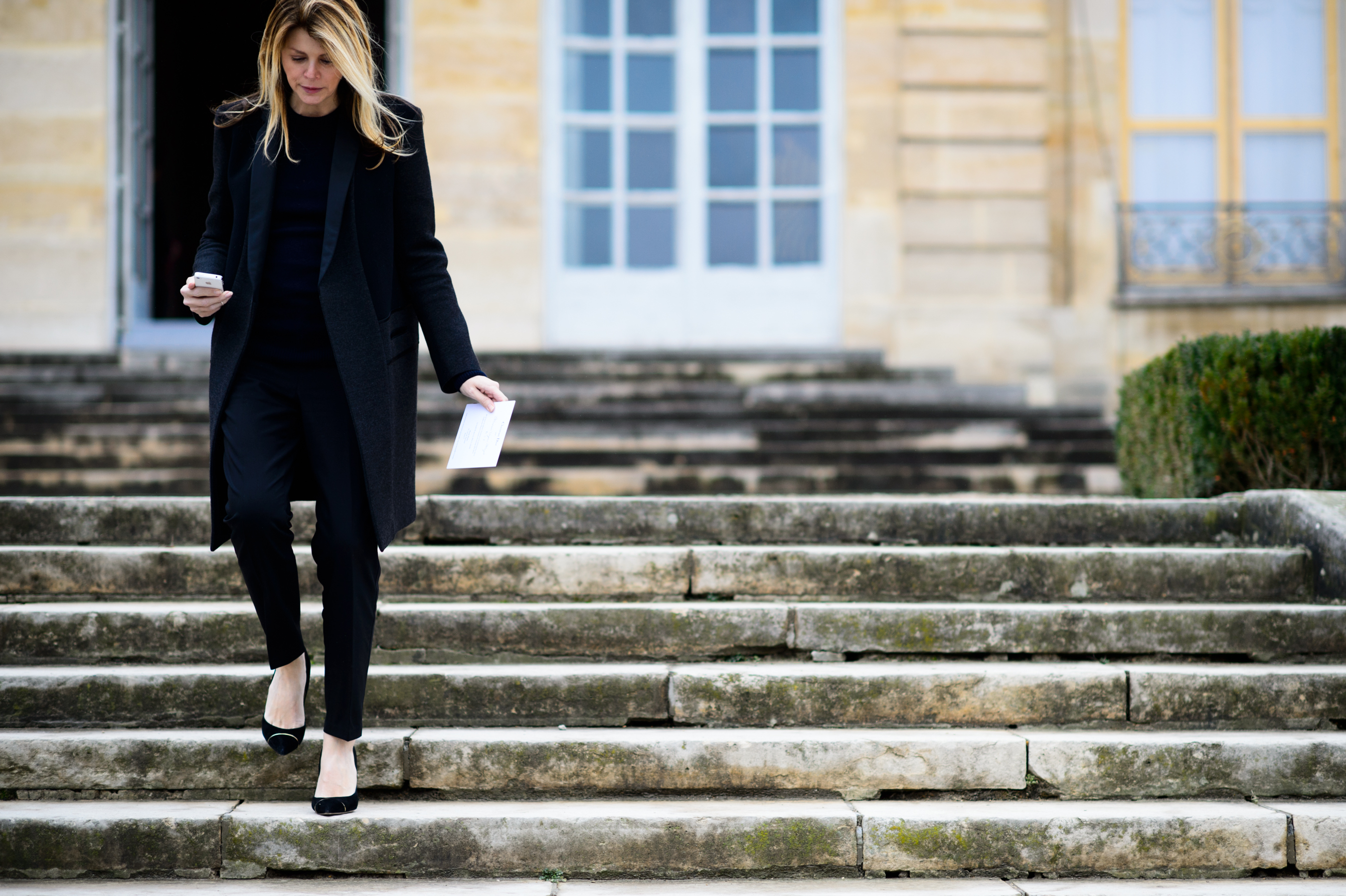Woman wearing black before Christian Dior couture show