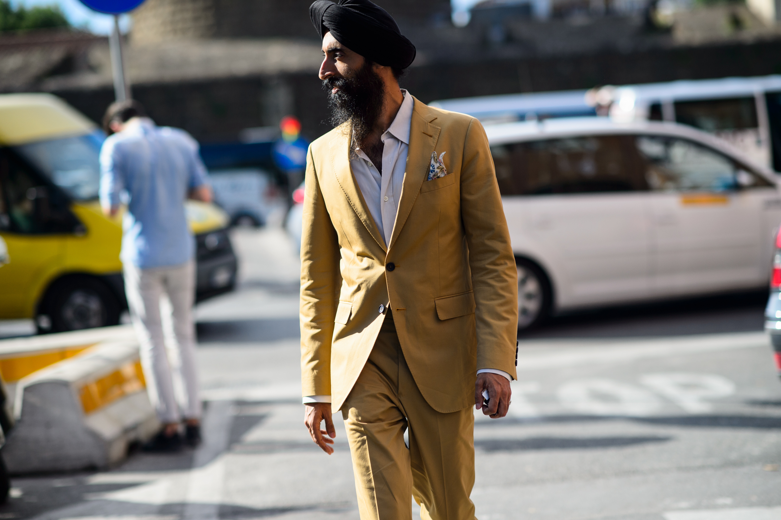 Indian actor wearing sand coloured suit