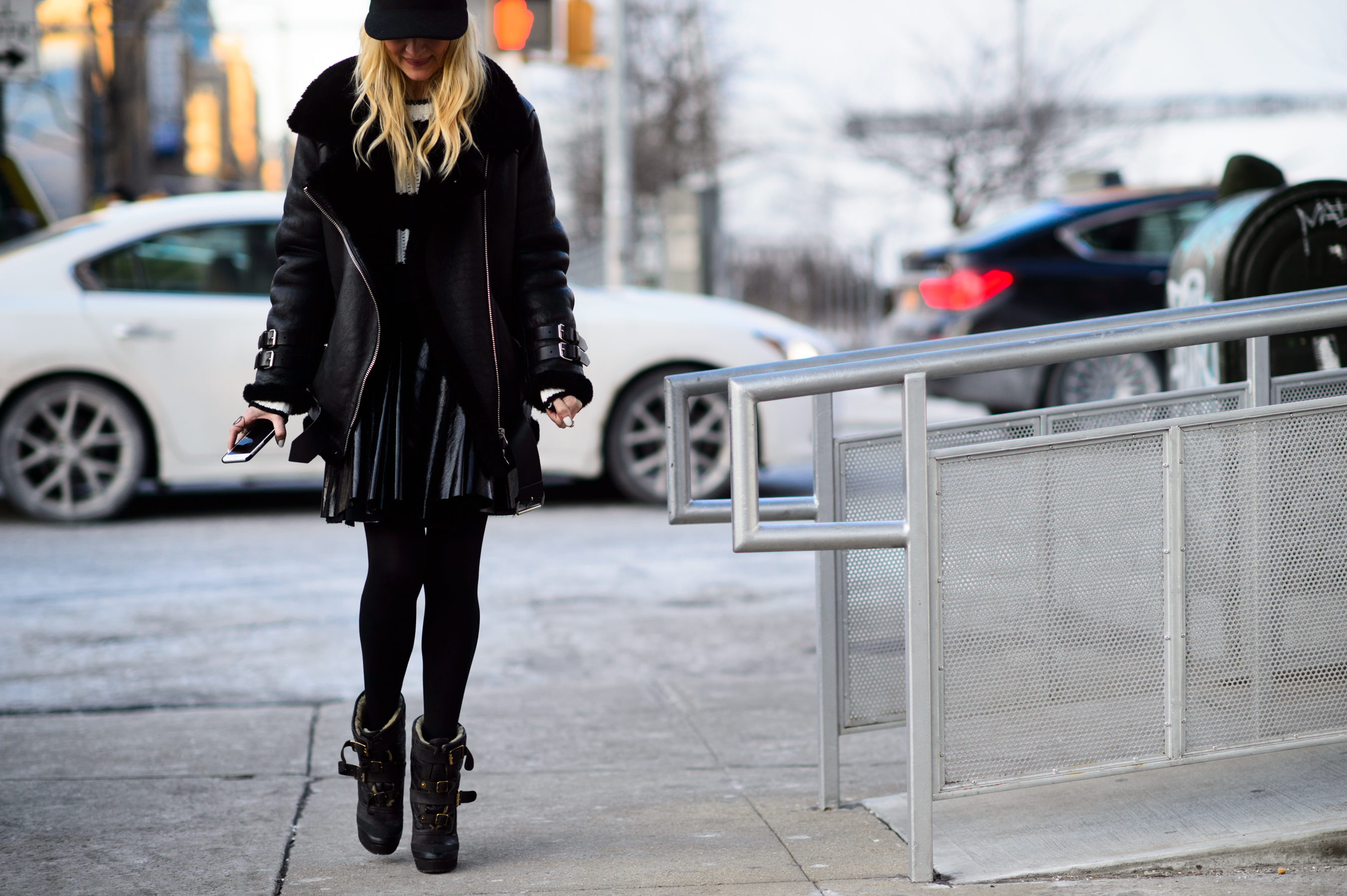 Woman wearing sheepskin coat