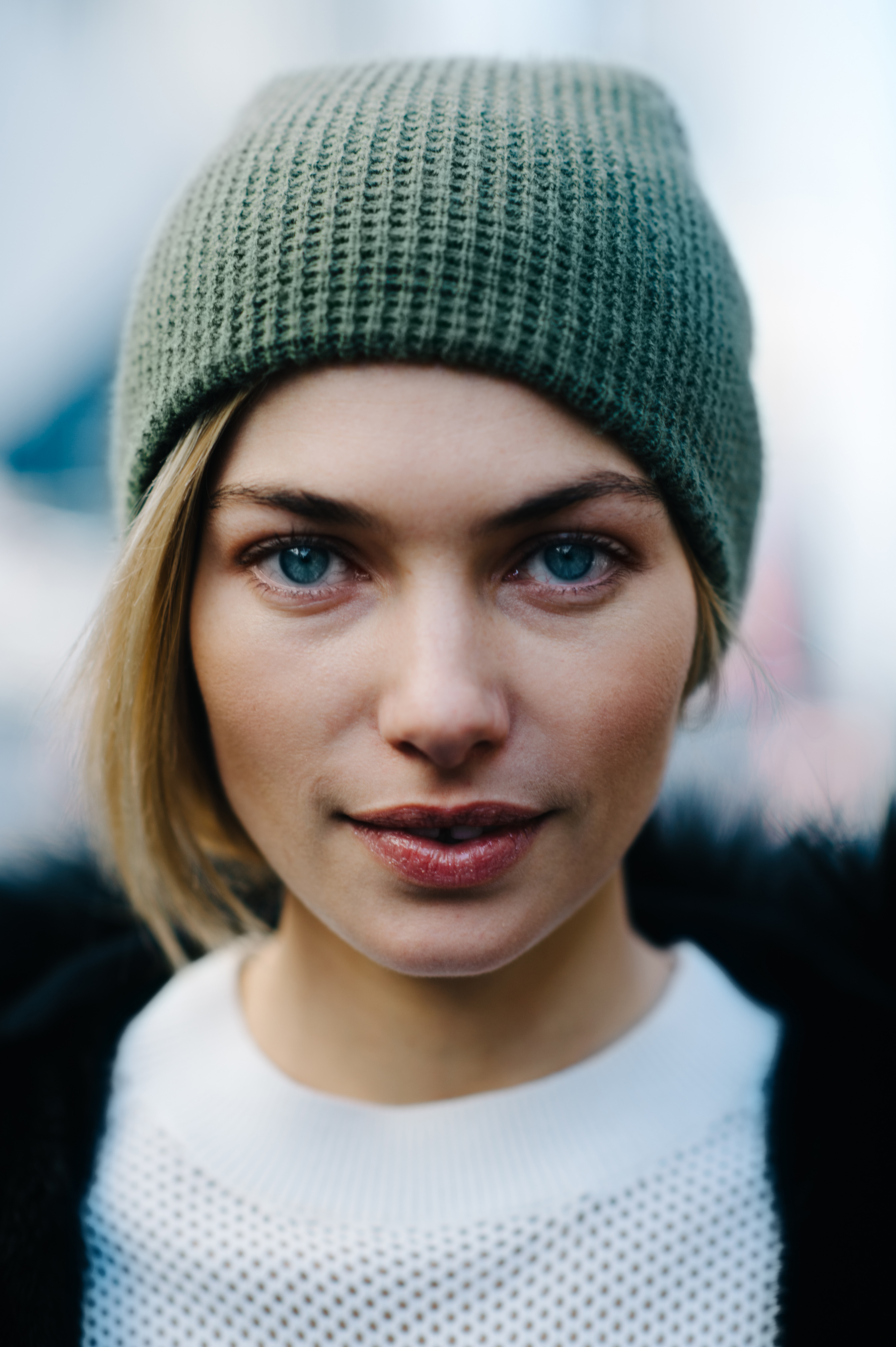 Portrait of a girl wearing green beanie