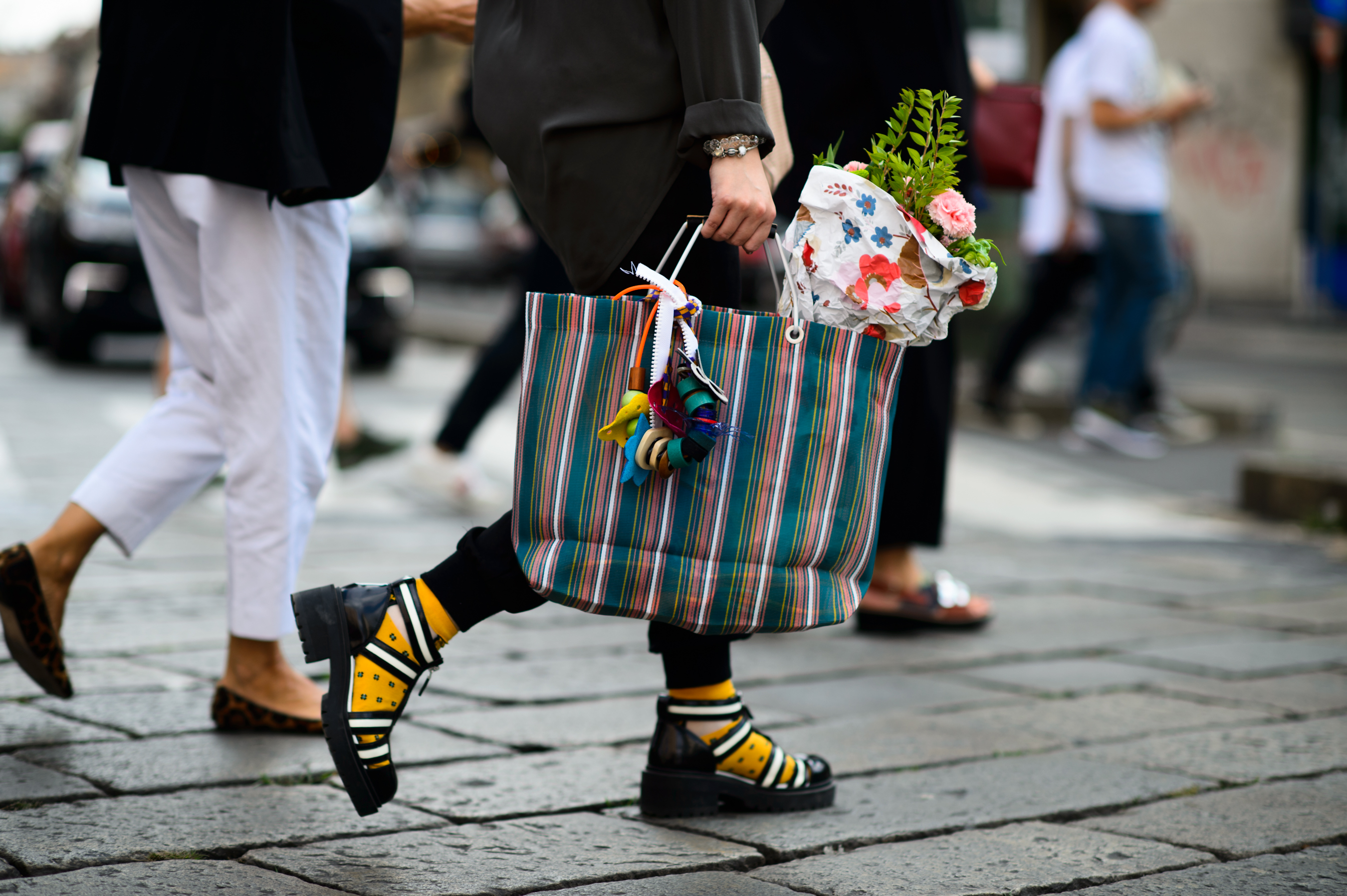 Woman wearing colourful socks and sandals