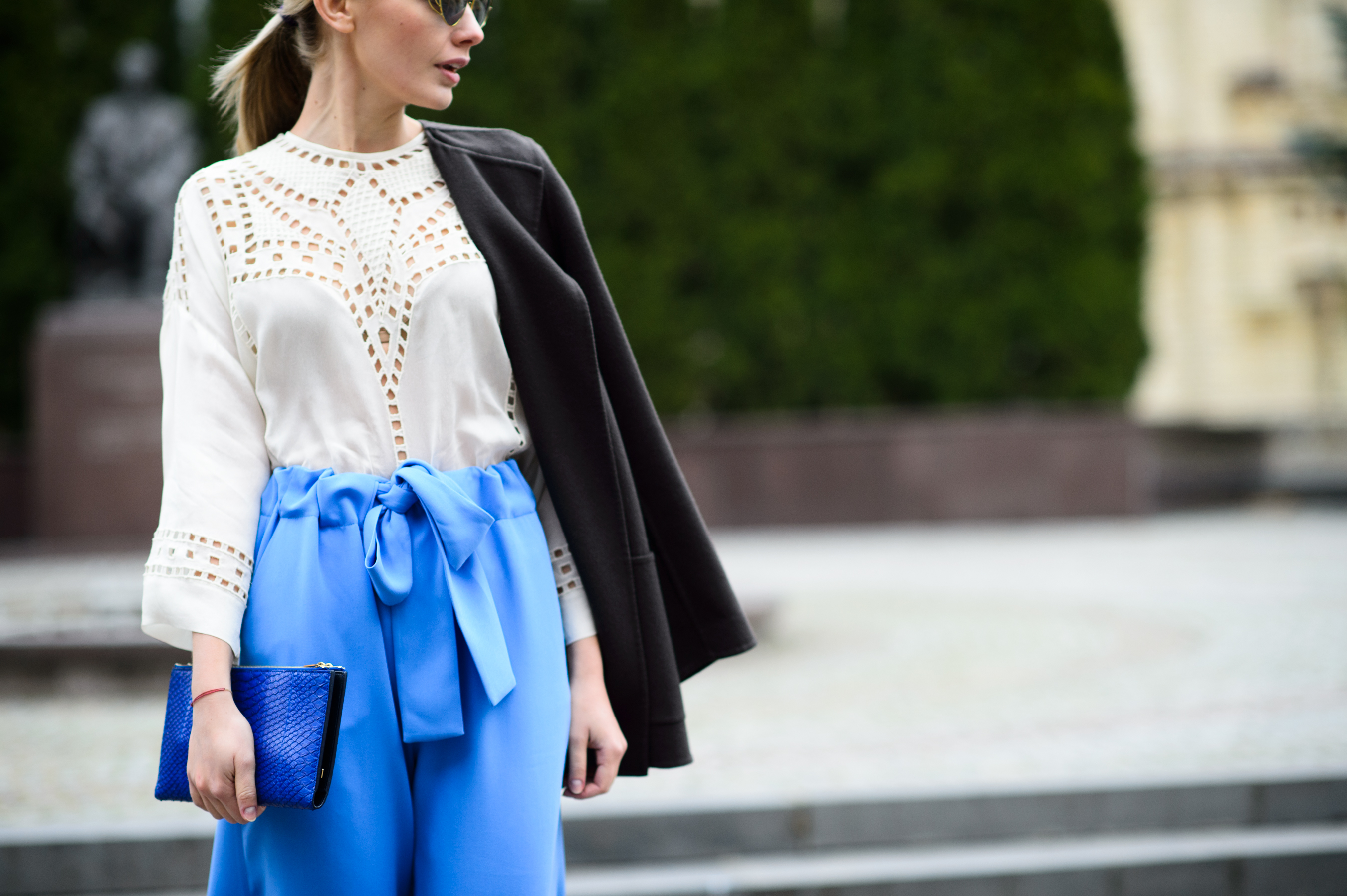 Ukrainian woman wearing blue silk pants with ribbon