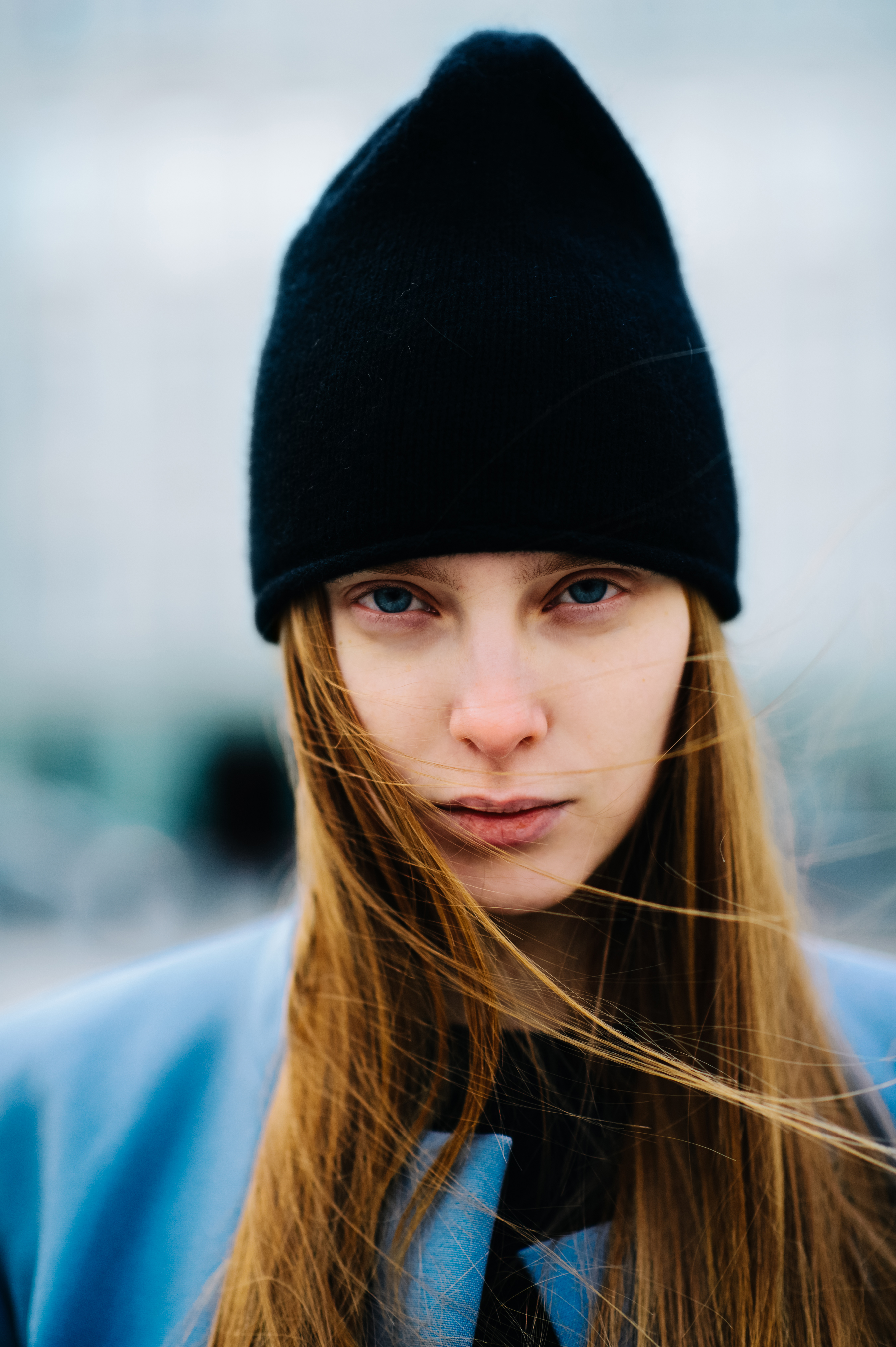 Russian model with blue eyes wearing black beanie