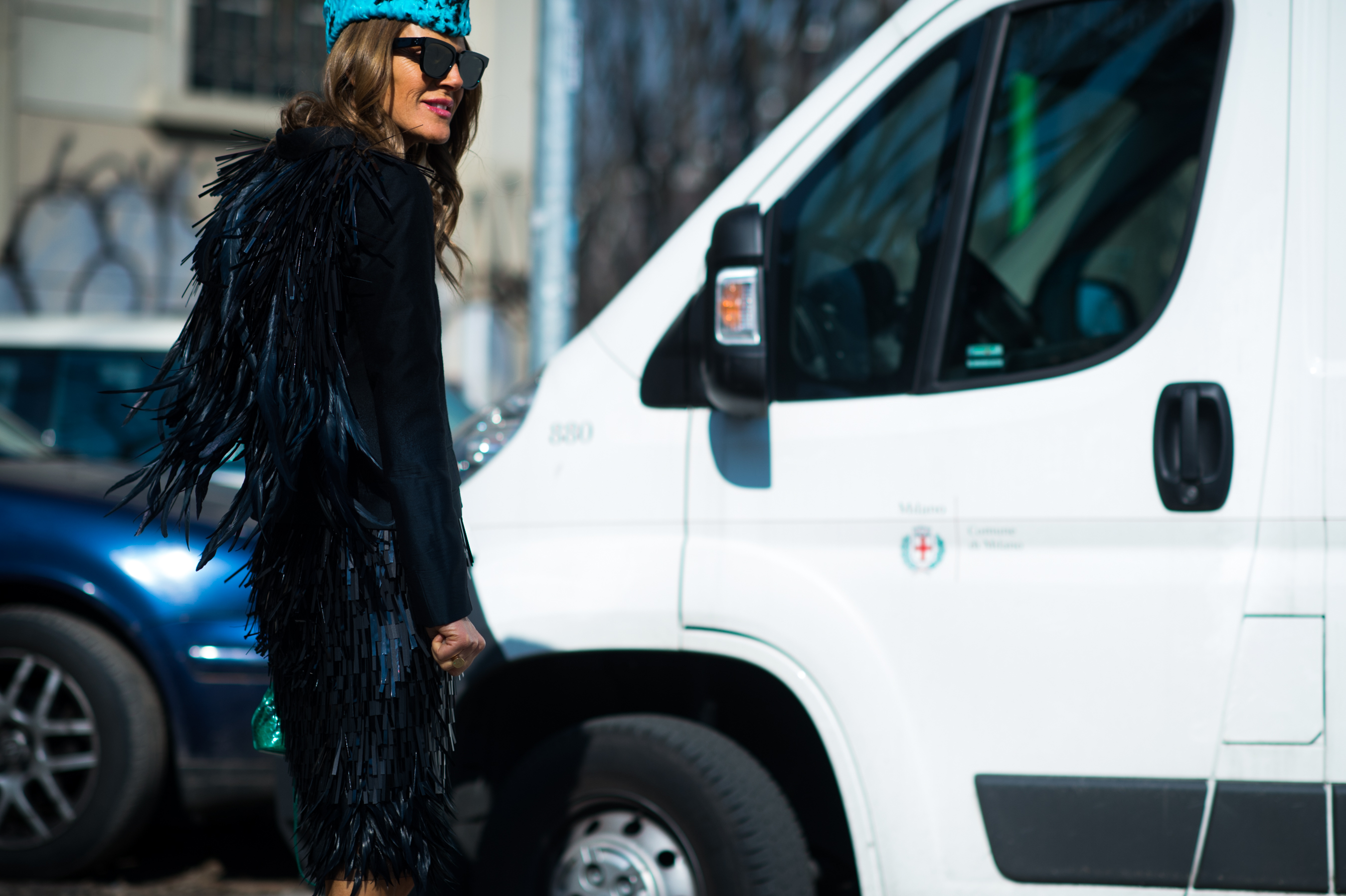 Japanese Vogue editor wearing feathers outfit