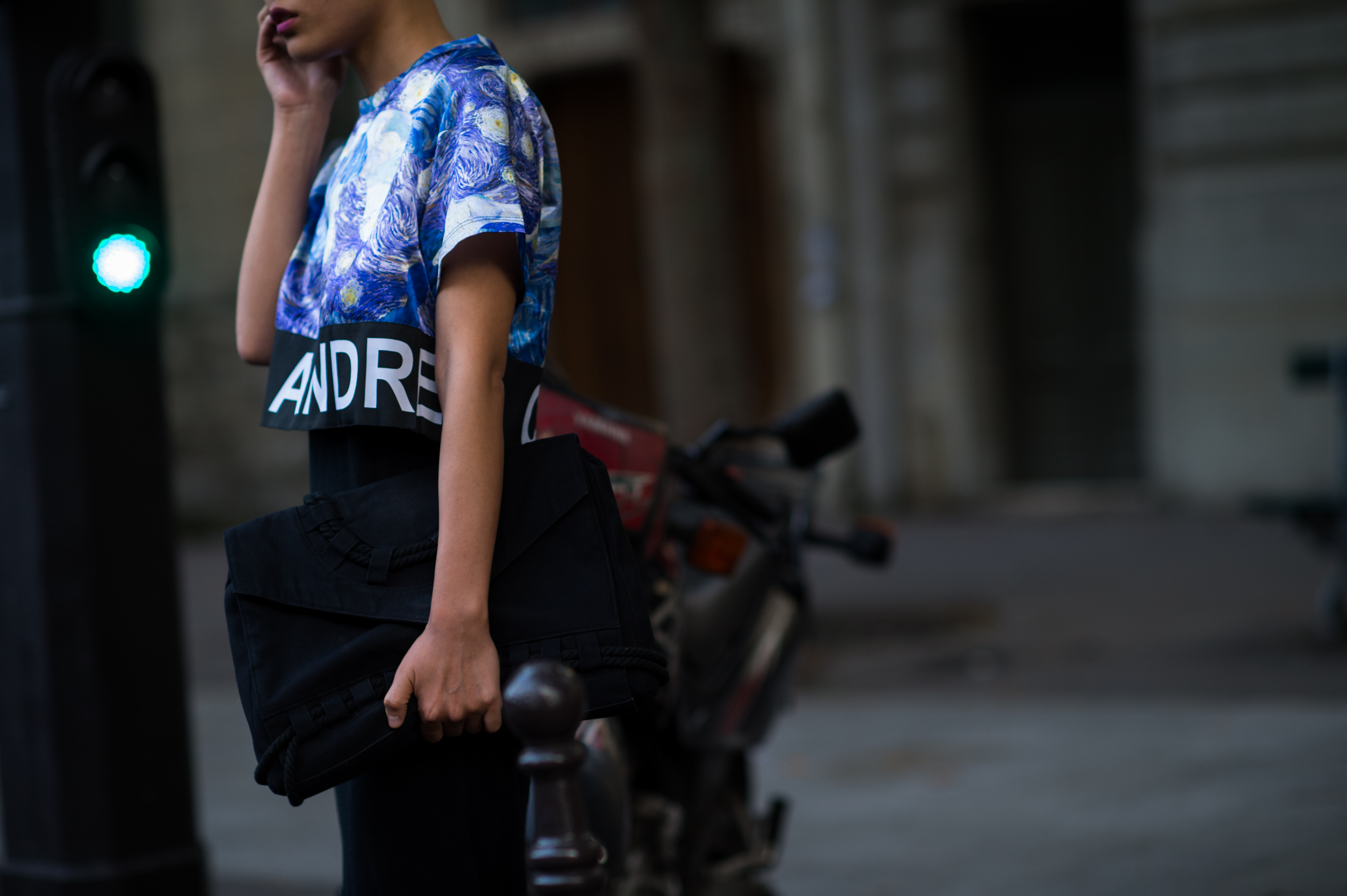Woman wearing shirt with Van Gogh print