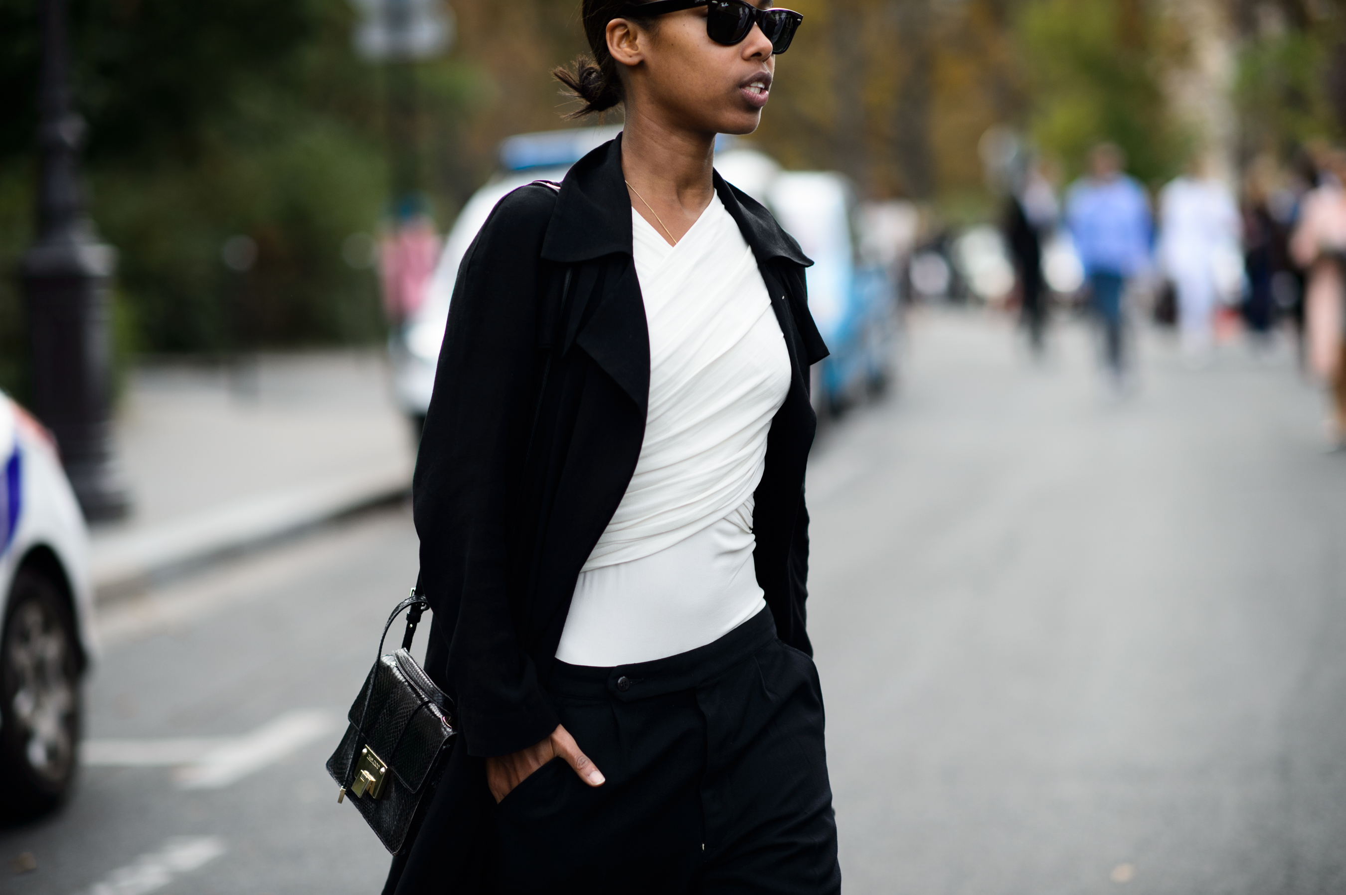 woman wearing white wrap around top