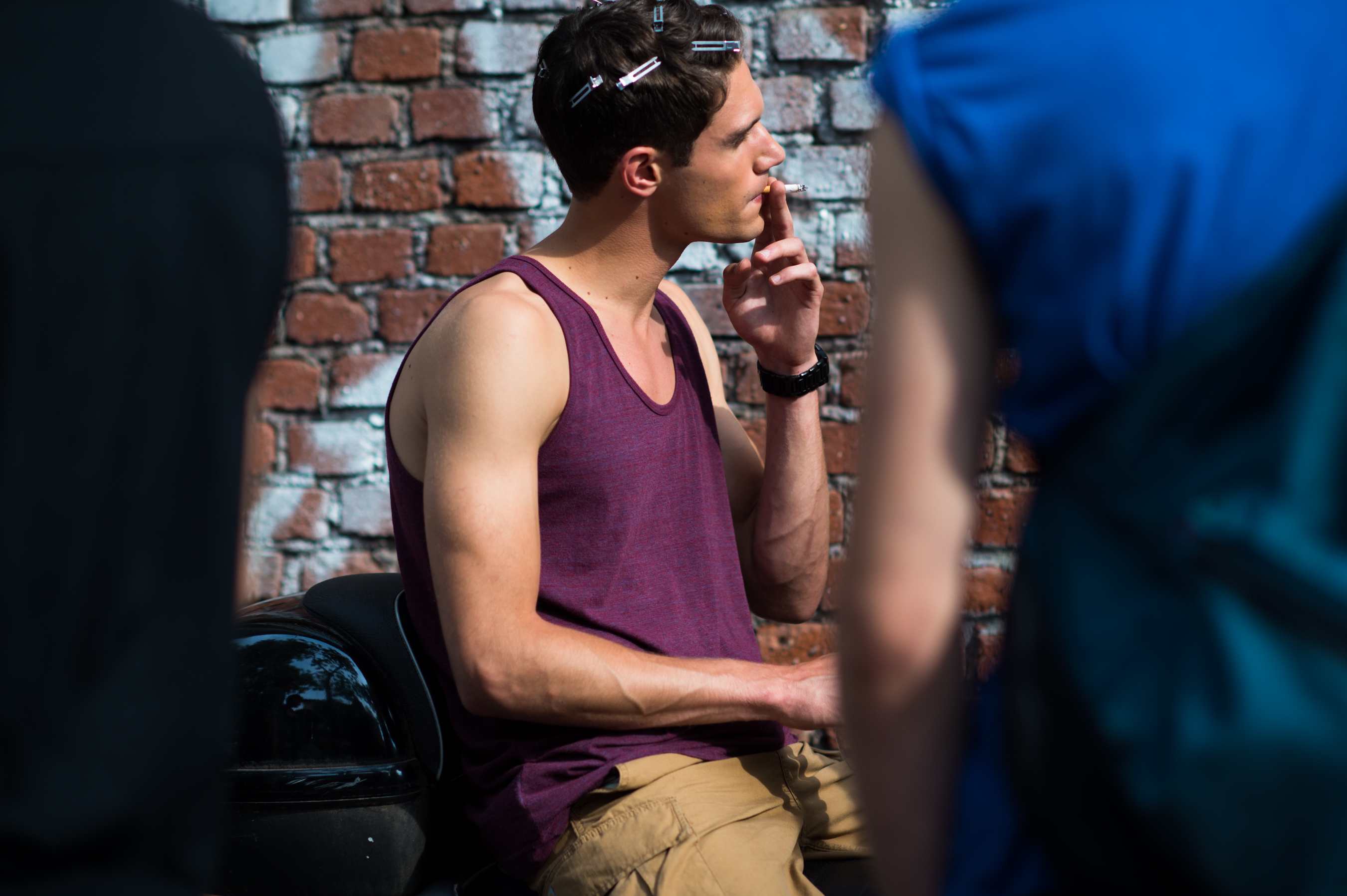 Male model with clips in his hair