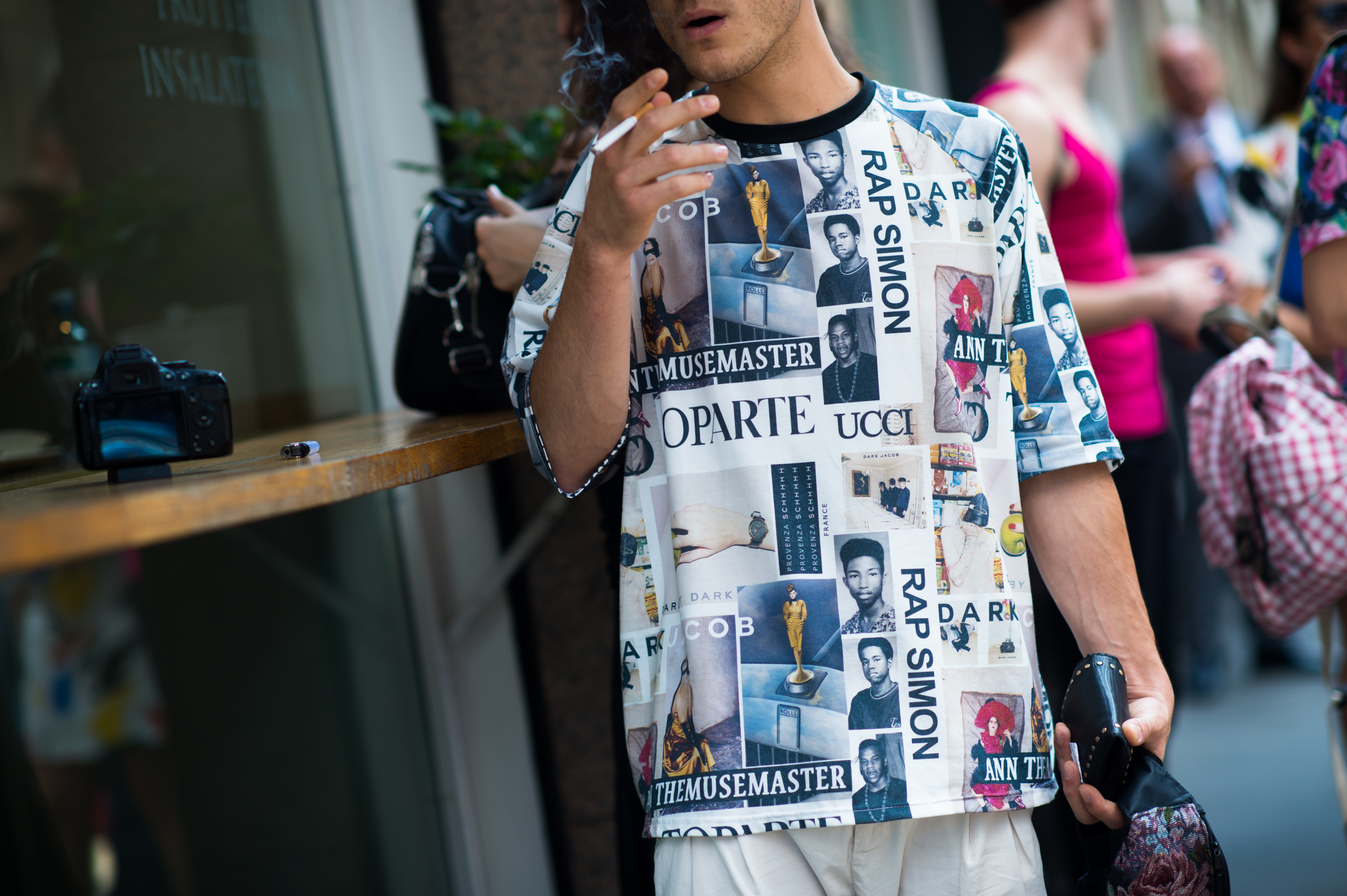 Man wearing collage print t-shirt